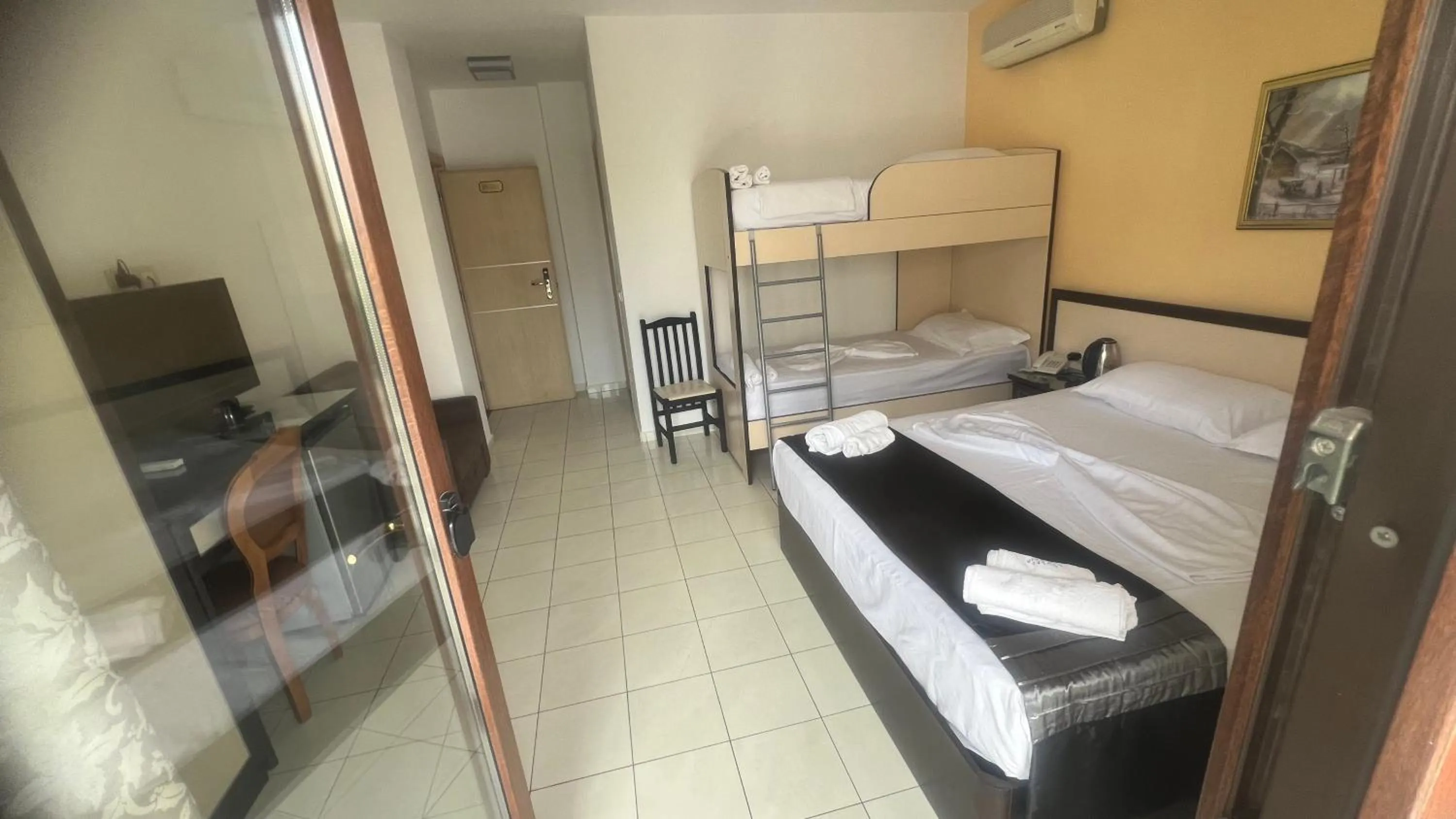 Bed in Sunrise Hotel Cameria