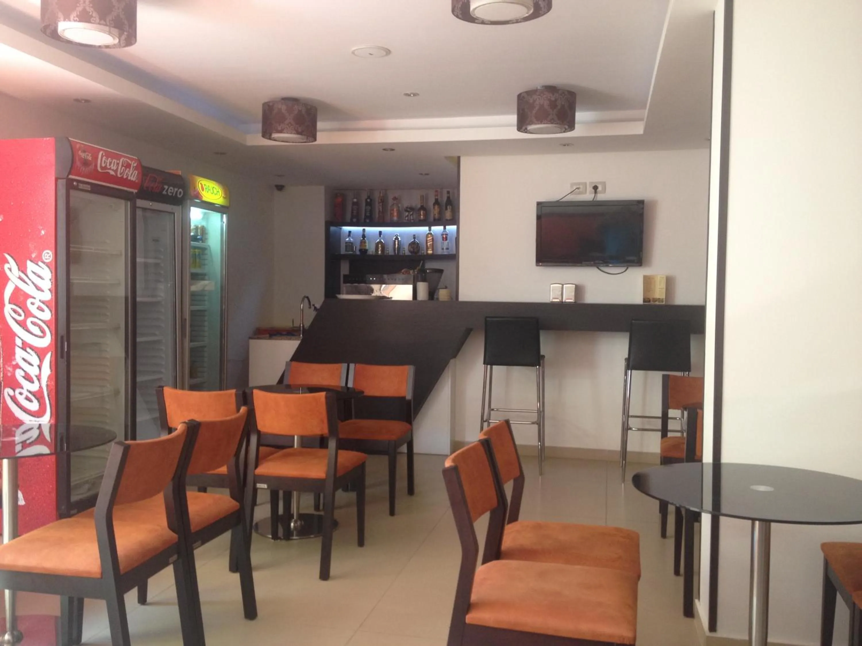 Communal lounge/ TV room in Sunrise Hotel Cameria