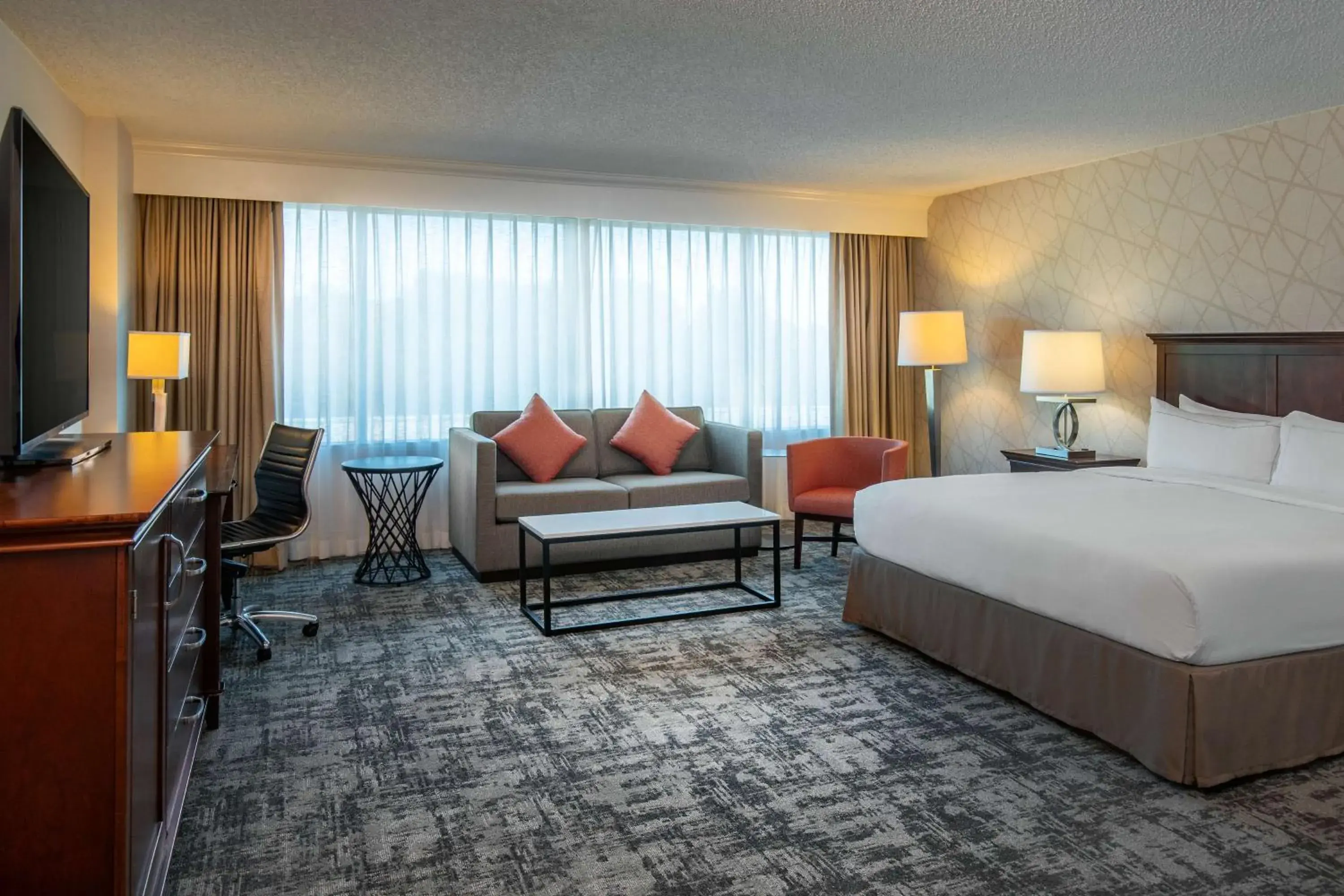 Junior King Suite with Seating Area in Hilton Greenville Junior King Suite with Seating Area in Hilton Greenville