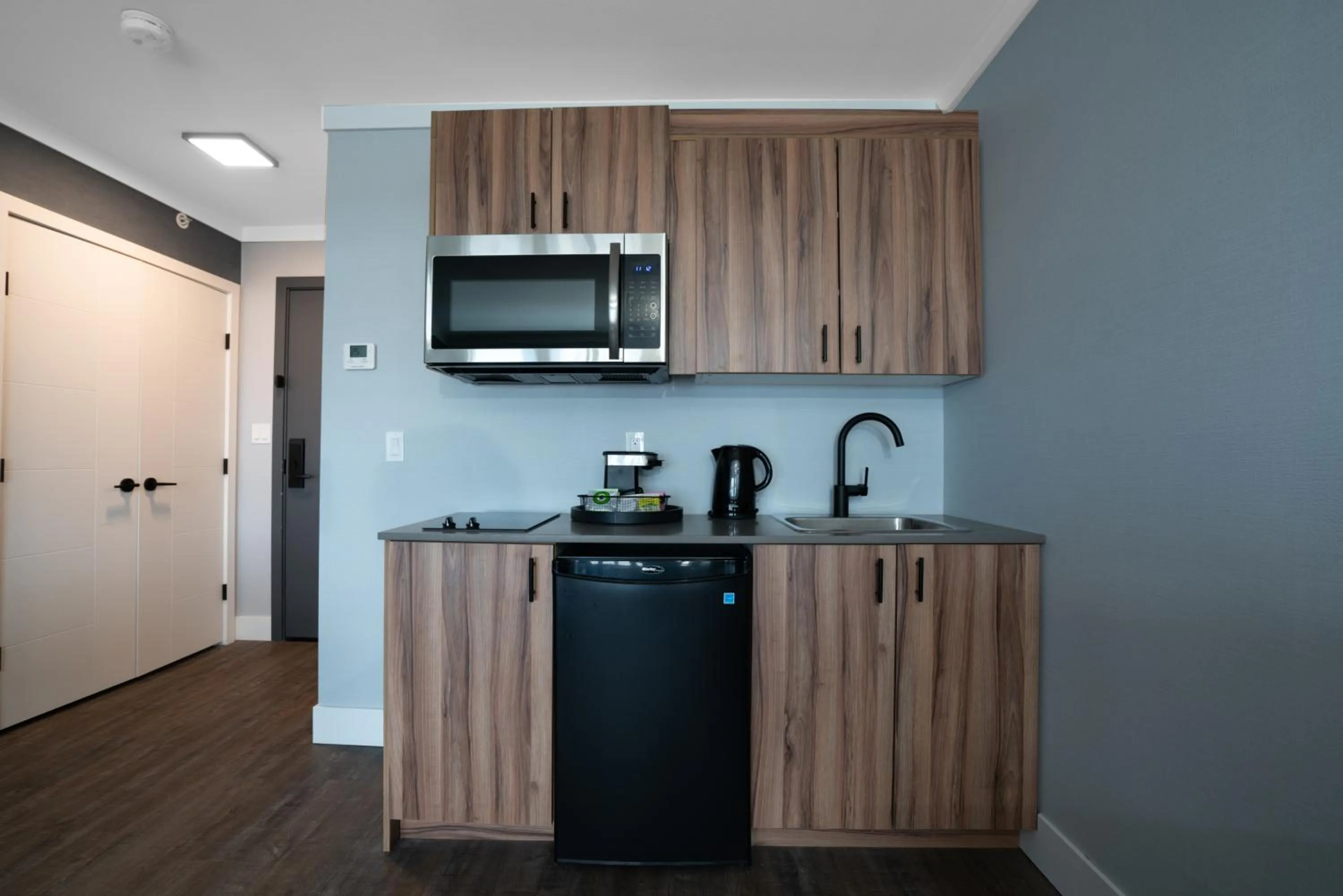 Kitchen or kitchenette in Prestige Kamloops Hotel