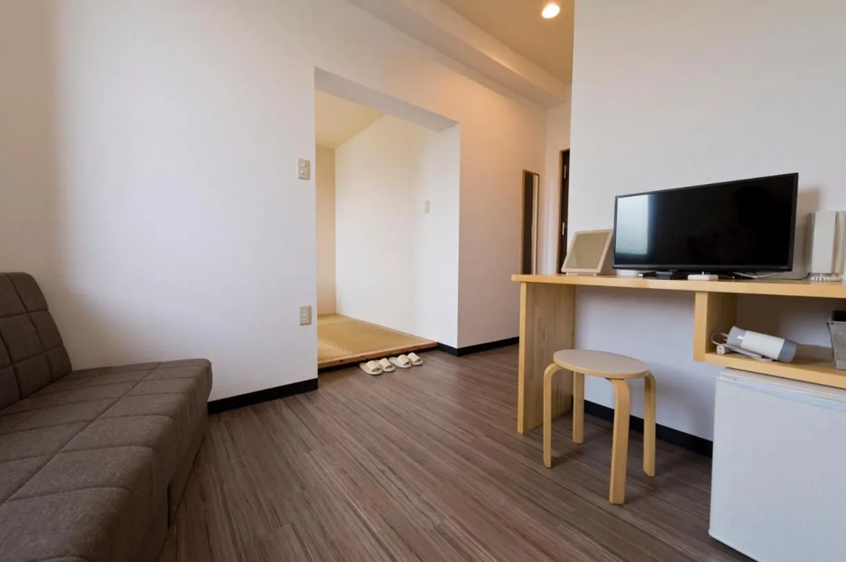 Photo of the whole room, TV/Entertainment Center in Onna Japanese Style Hotel Hokkaisou