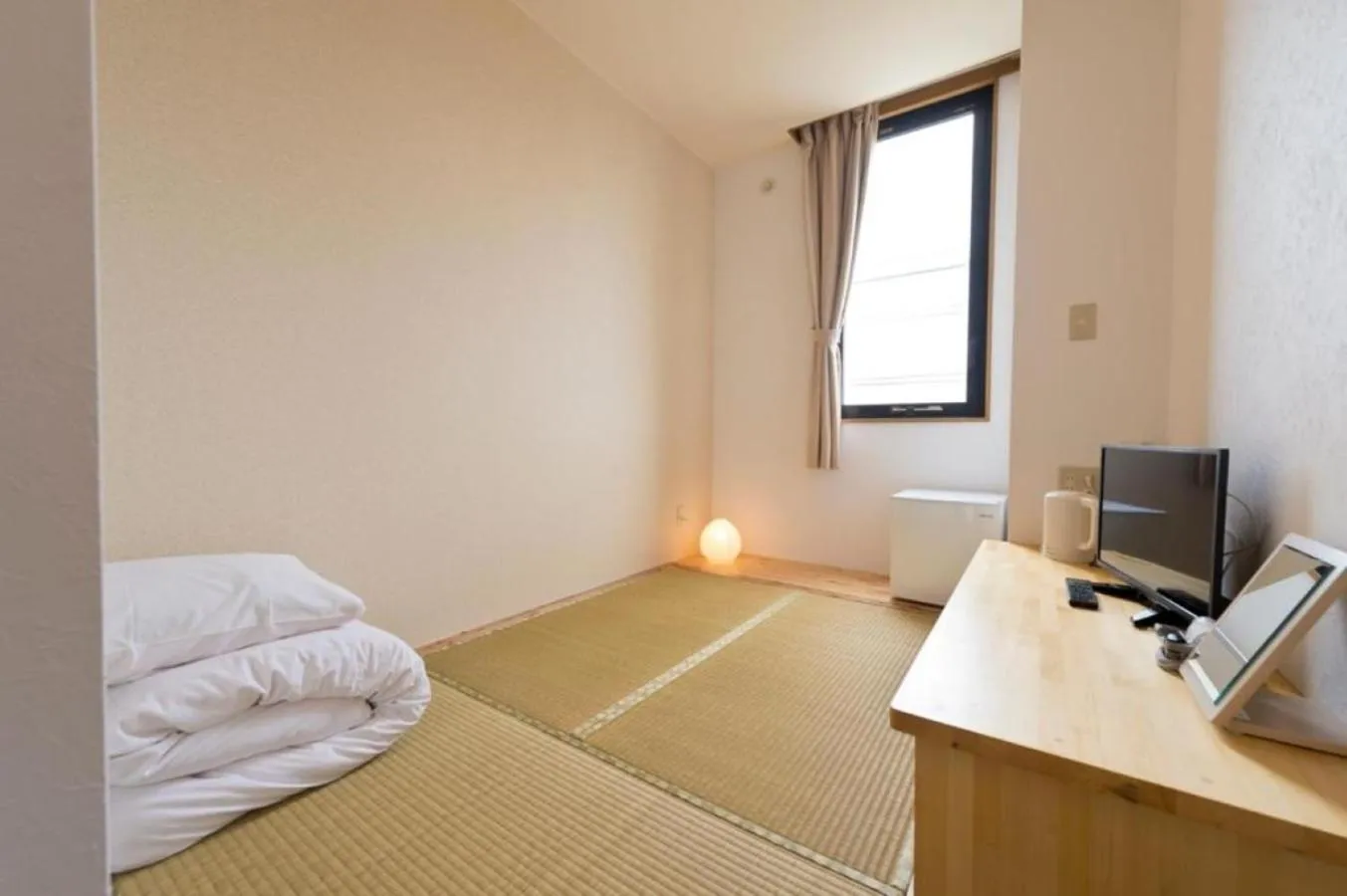 TV/Entertainment Center in Onna Japanese Style Hotel Hokkaisou