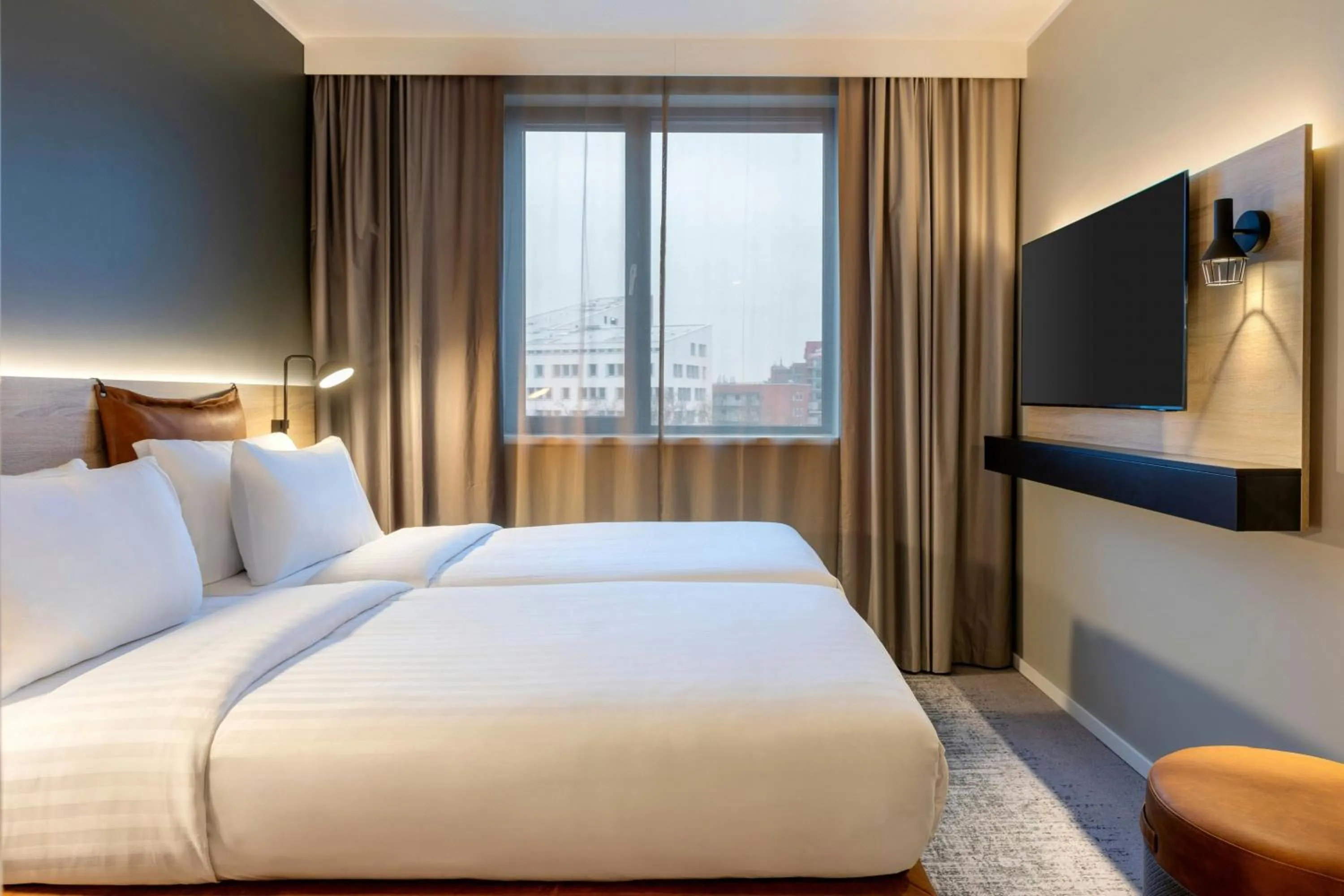 Photo of the whole room, Bed in Moxy Berlin Ostbahnhof