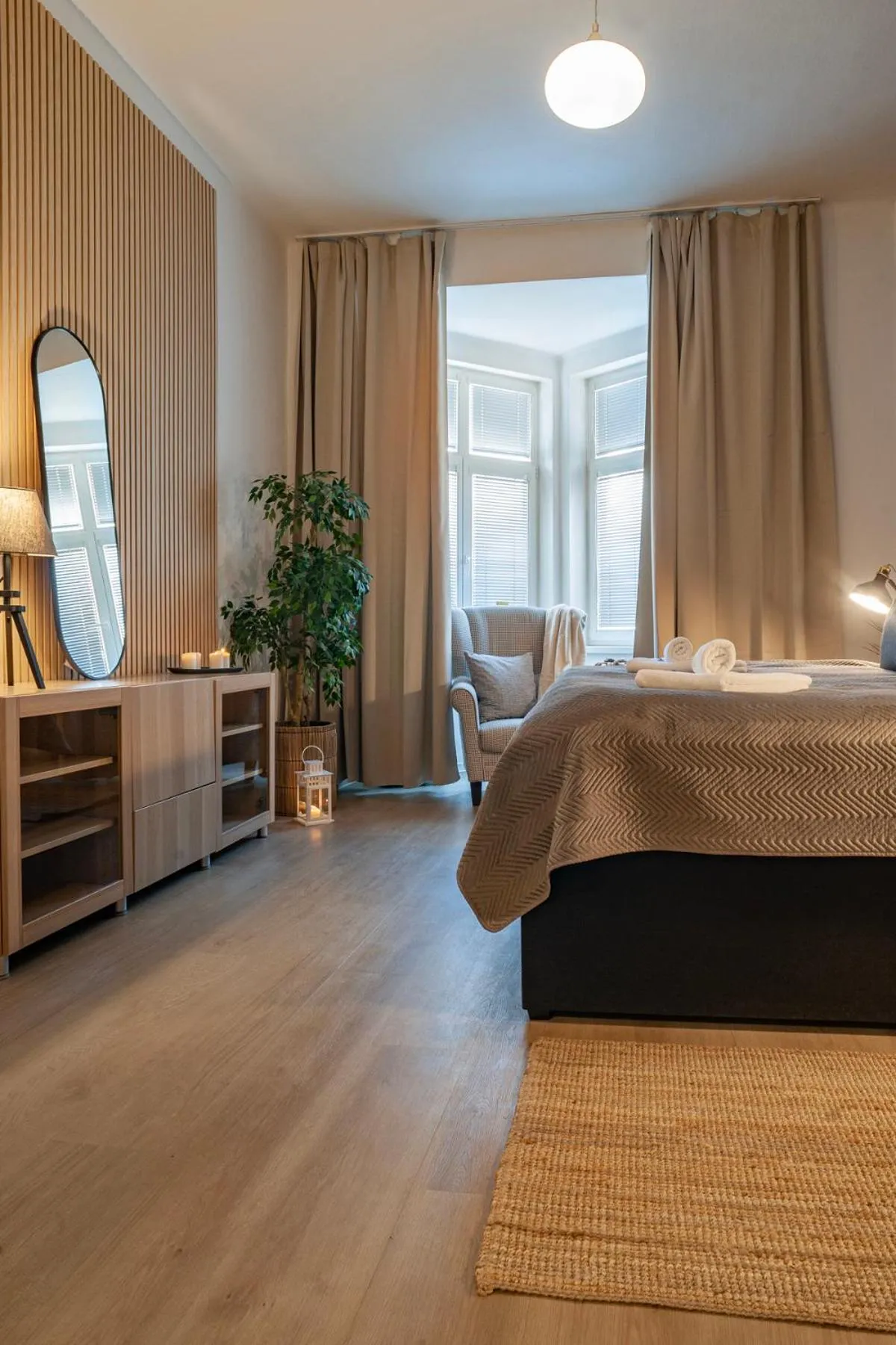 Bed in STING Boutique Apartments