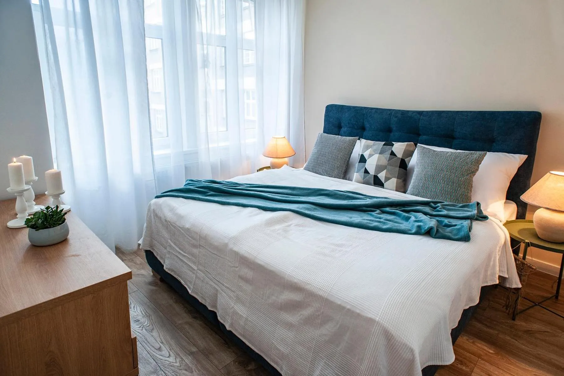 Bed in STING Boutique Apartments