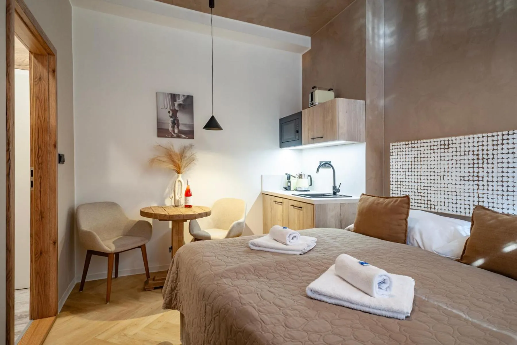 Bed in STING Boutique Apartments