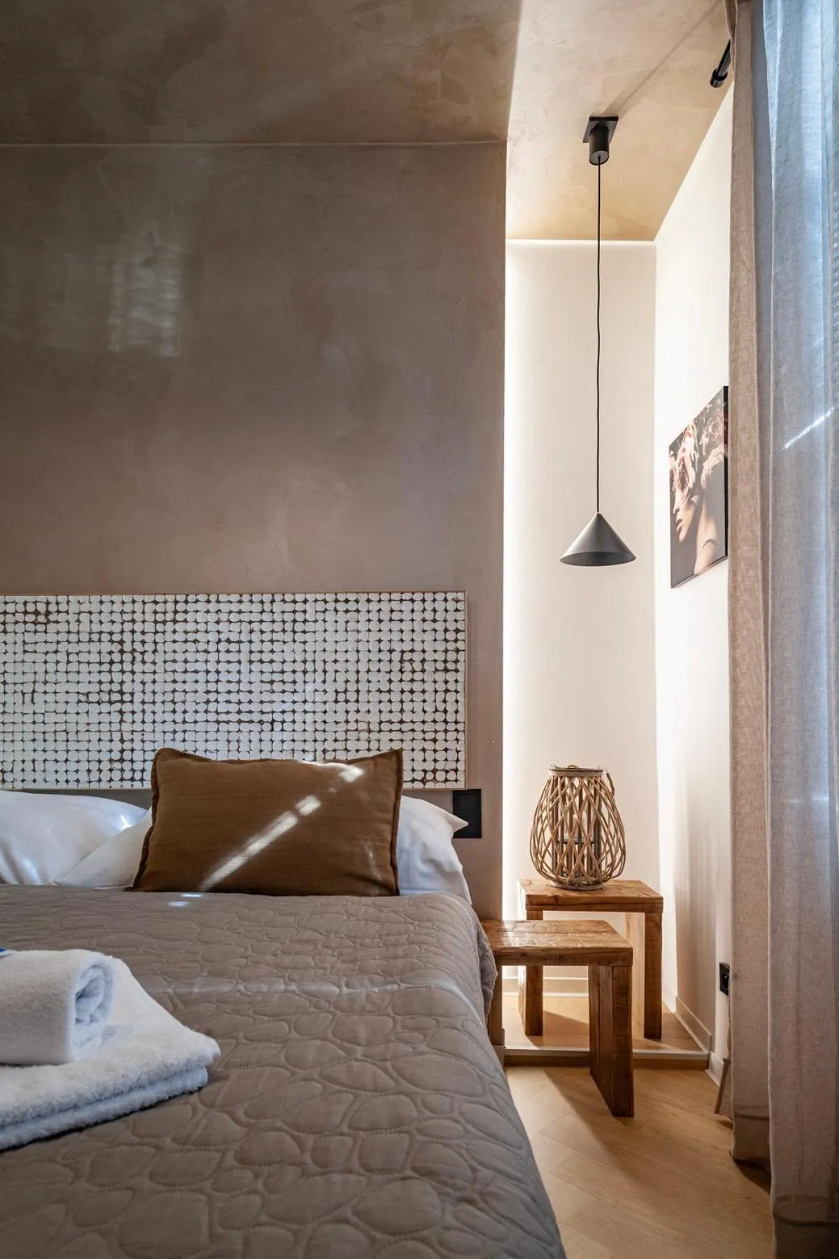 Bed in STING Boutique Apartments