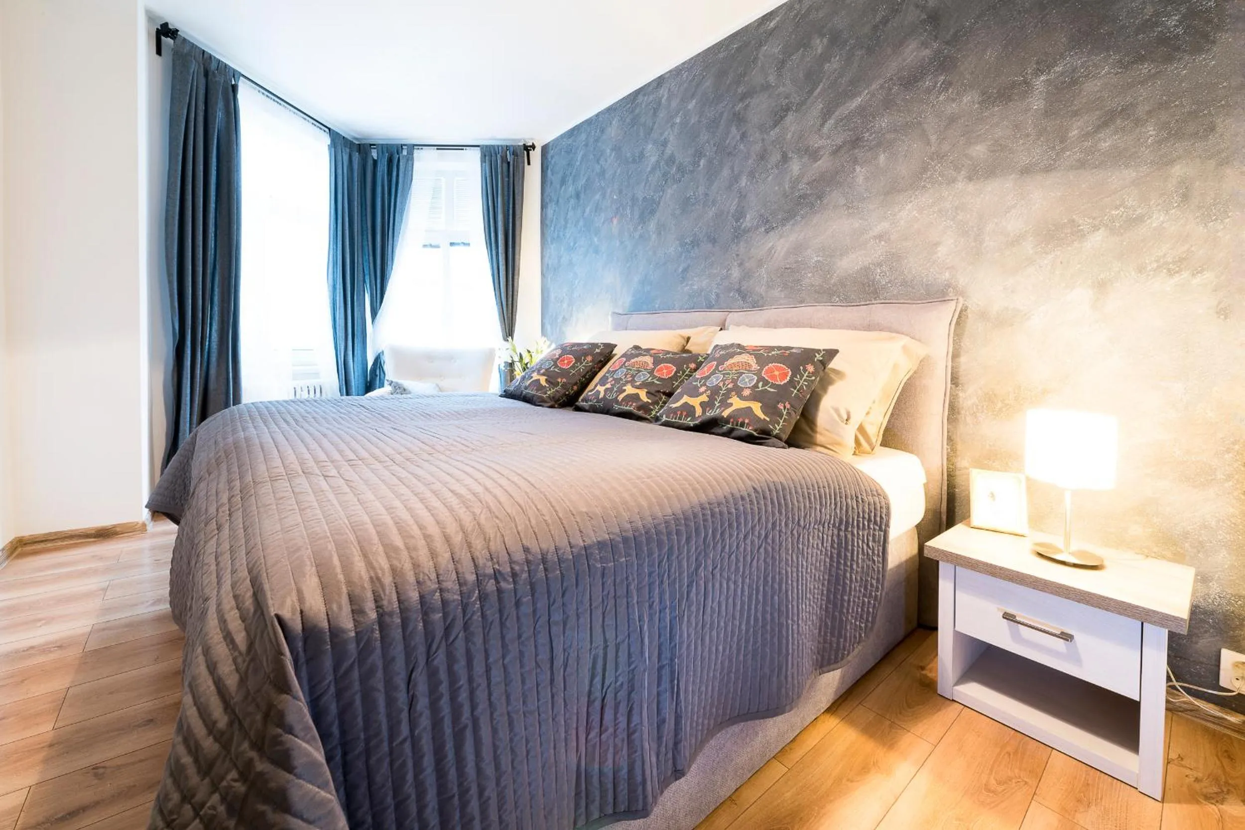 Bed in STING Boutique Apartments