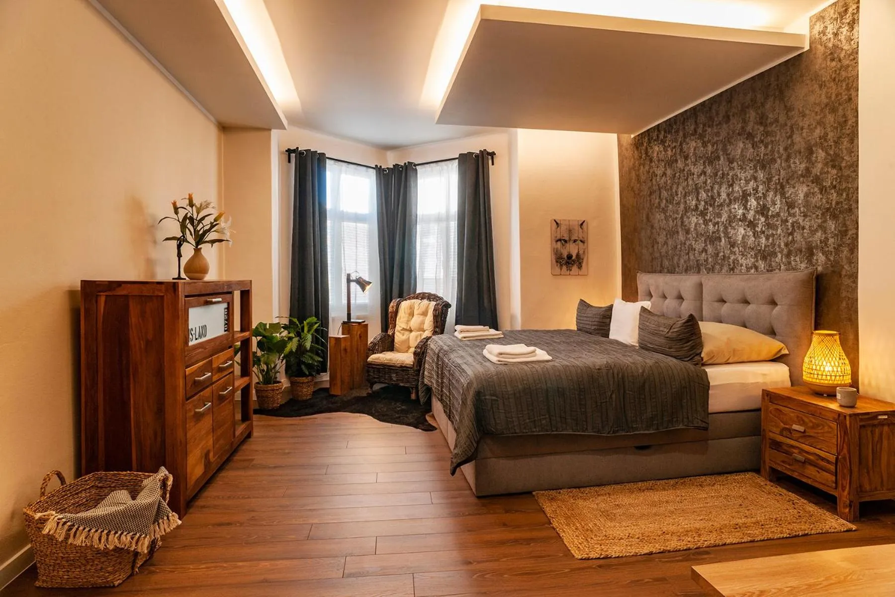 Bed in STING Boutique Apartments