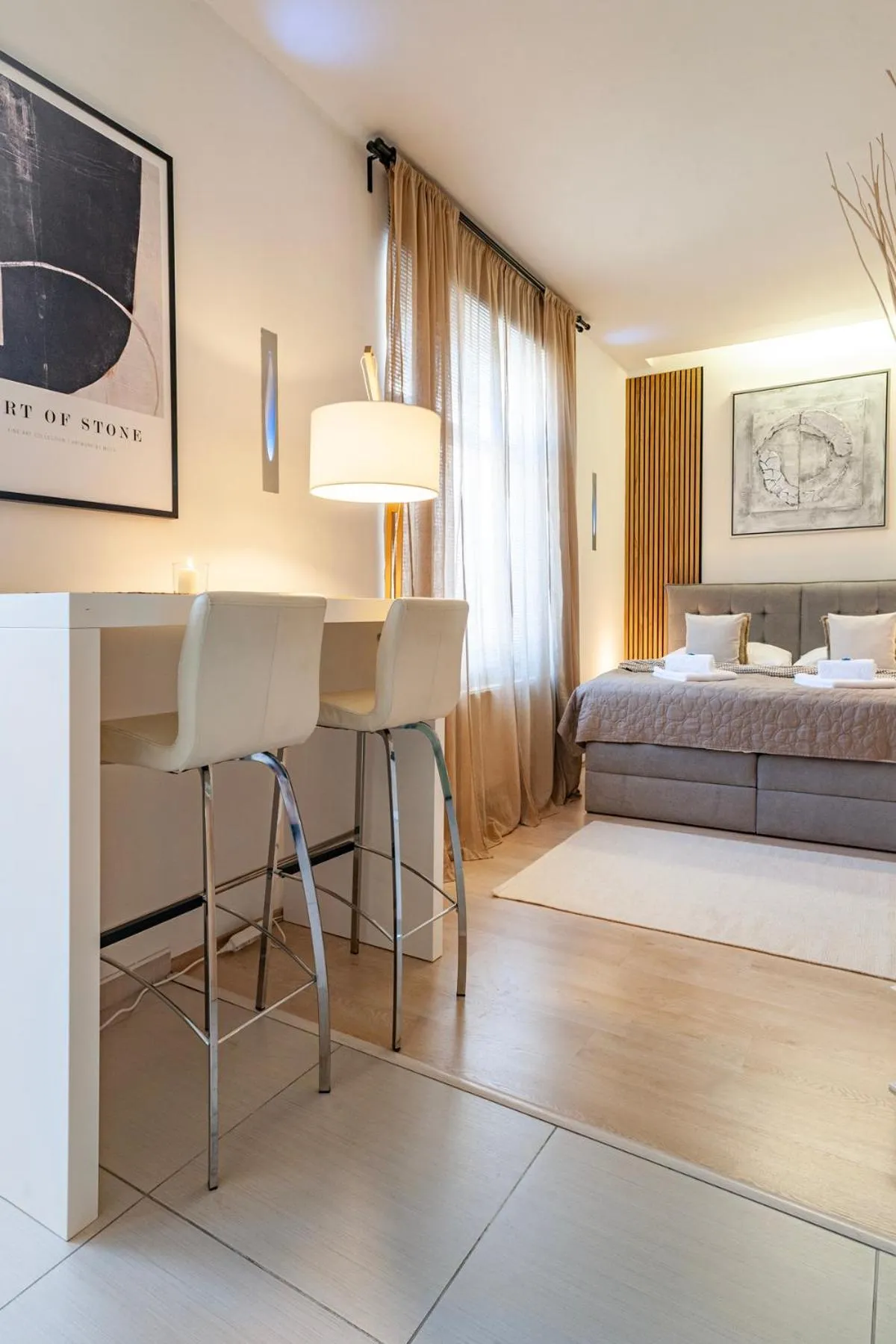 Bed in STING Boutique Apartments