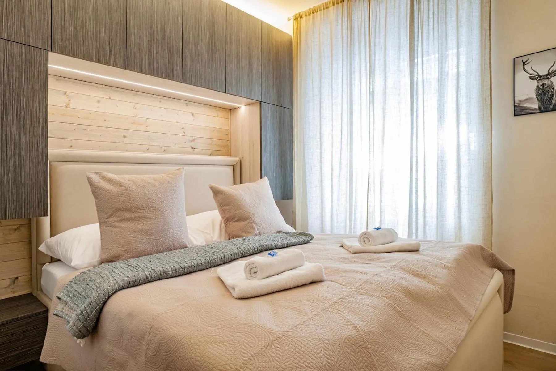 Bed in STING Boutique Apartments