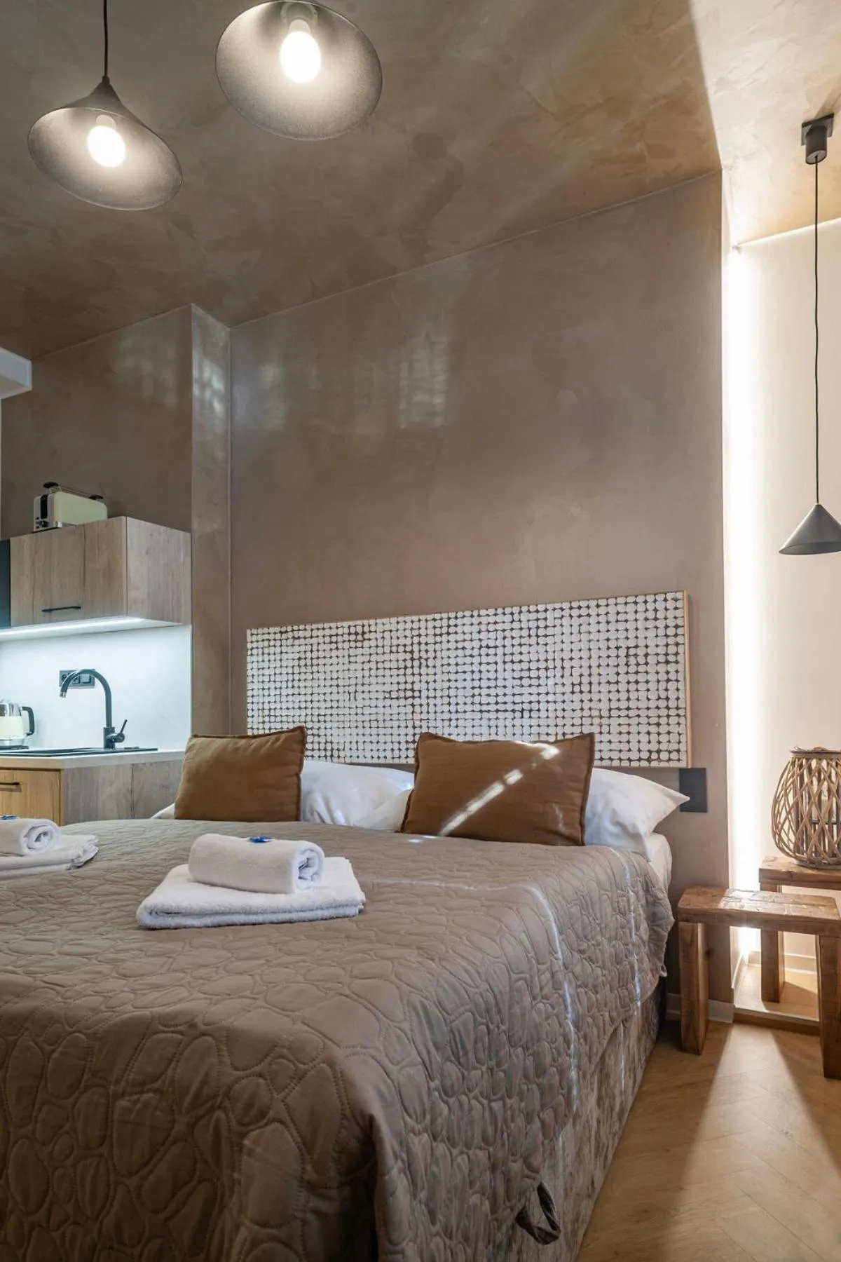 Bed in STING Boutique Apartments