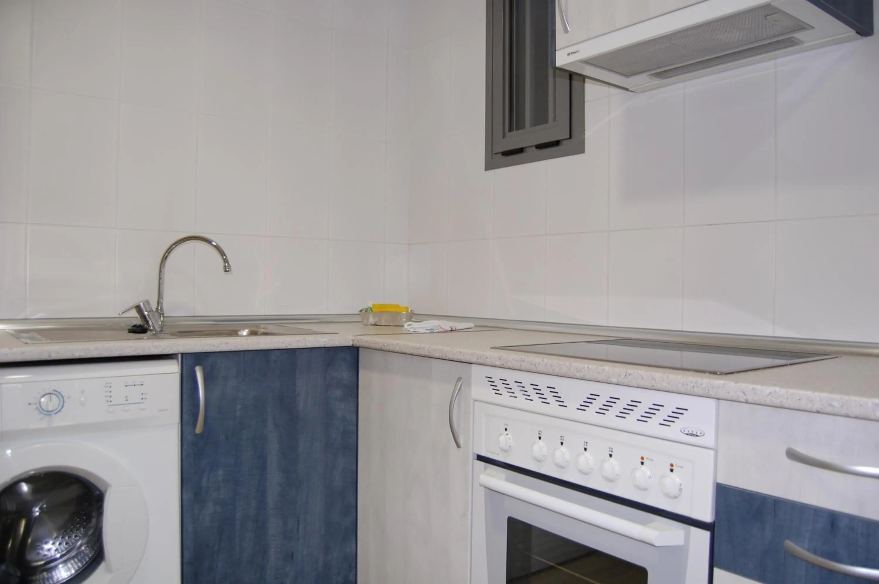 Kitchen or kitchenette in Aparthotel Encasa