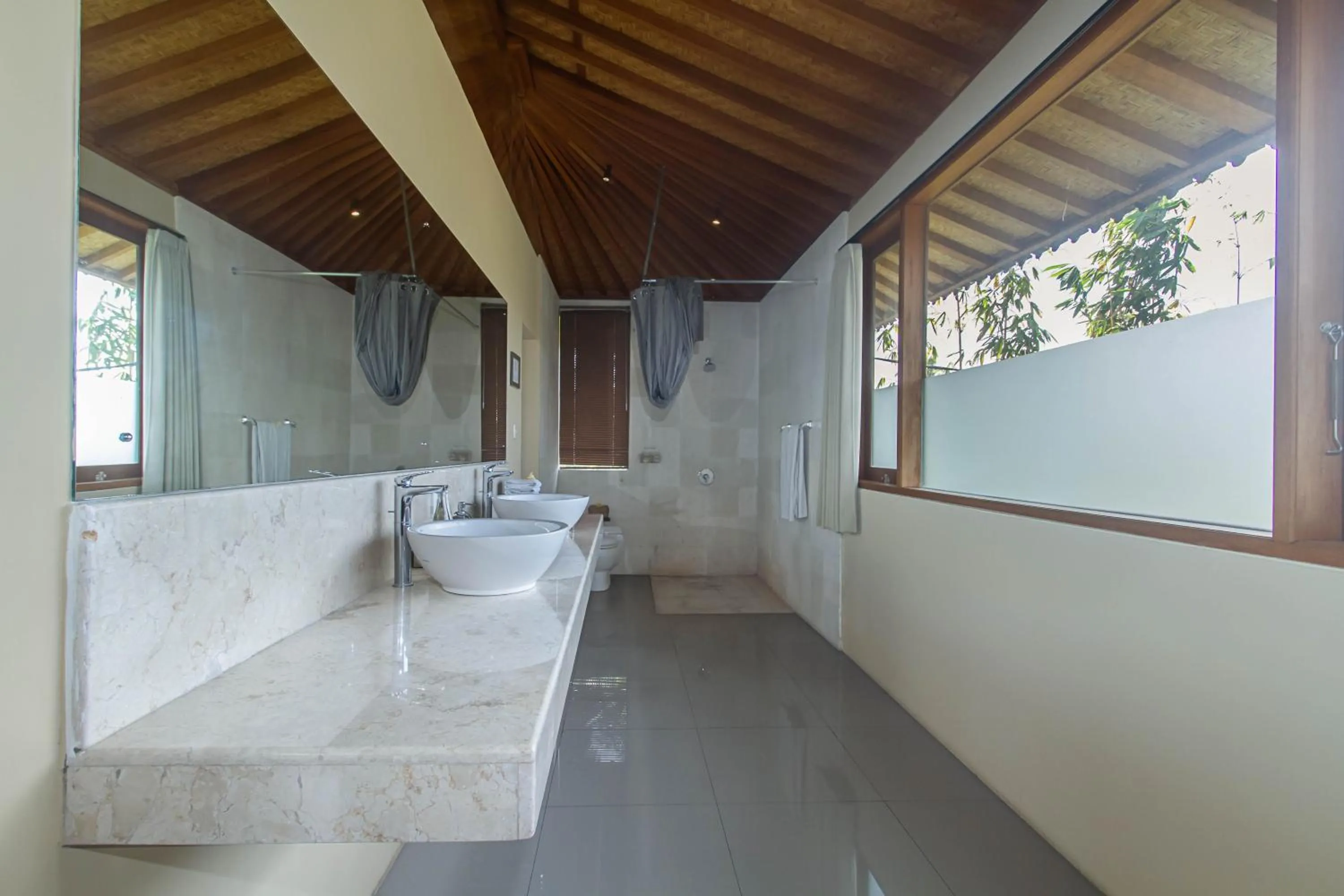 Toilet in Kabinawa Ubud Villas by GenuineHost