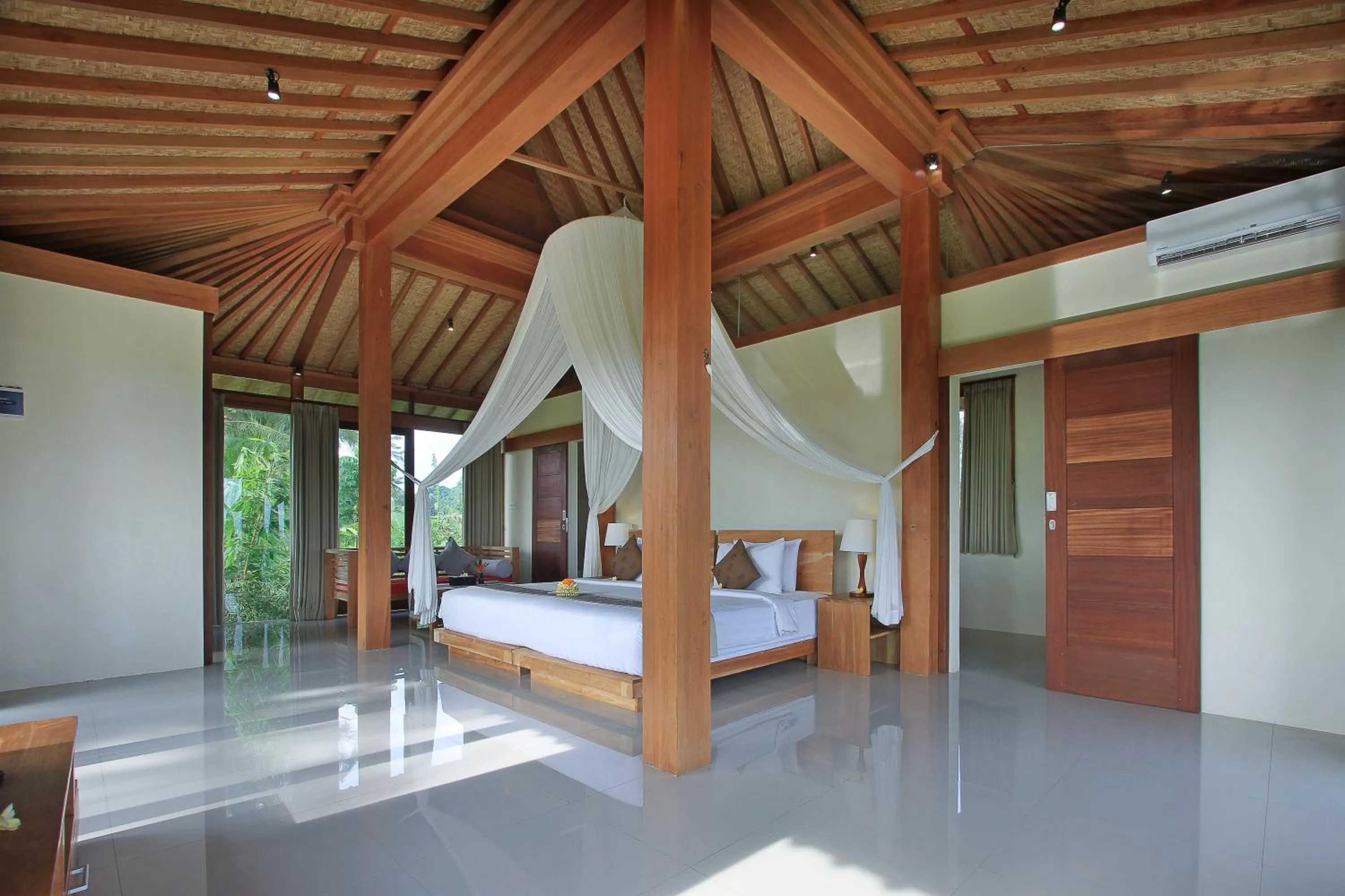 Bed in Kabinawa Ubud Villas by GenuineHost