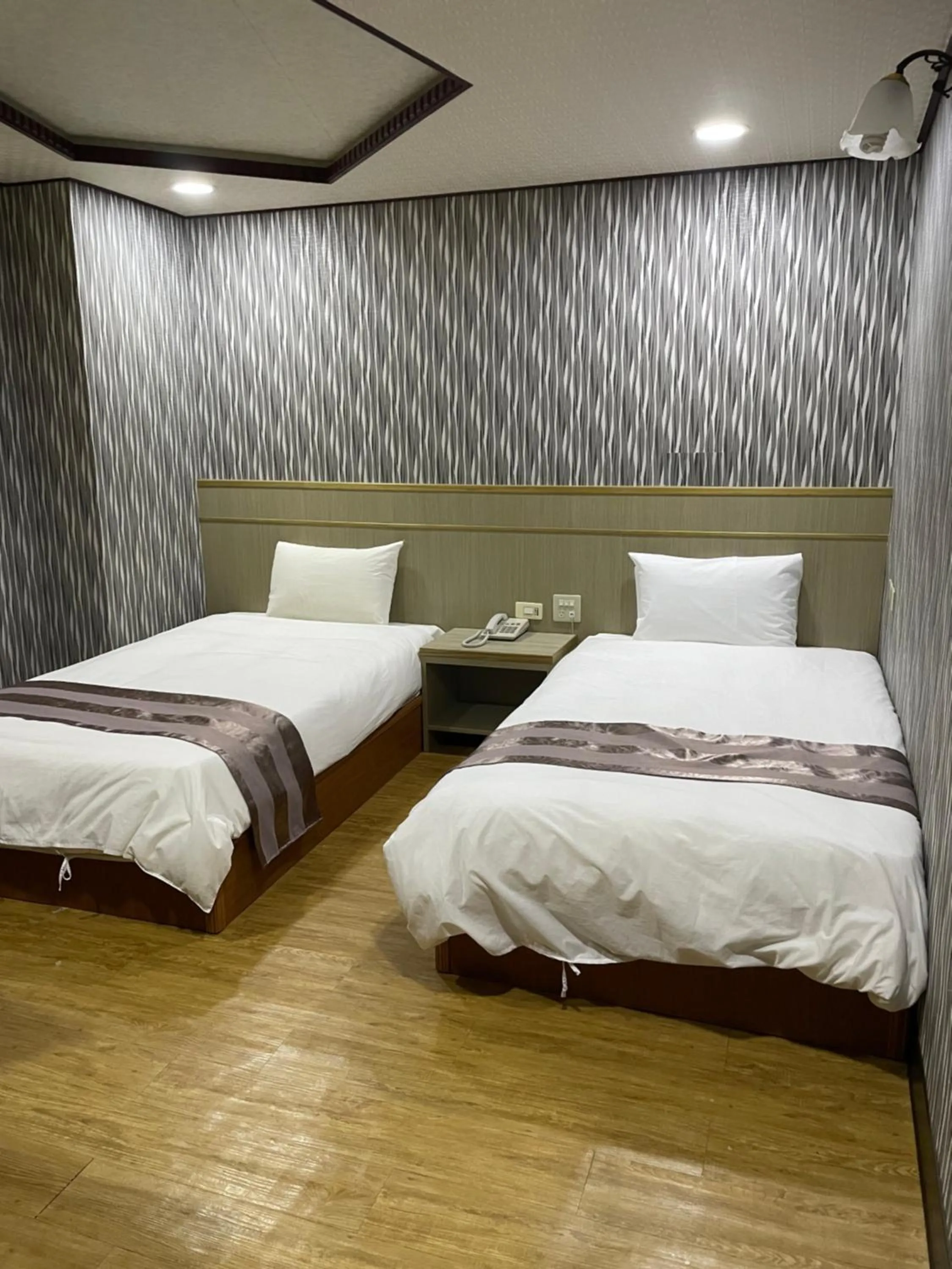 Bed in Mei Hua Hotel