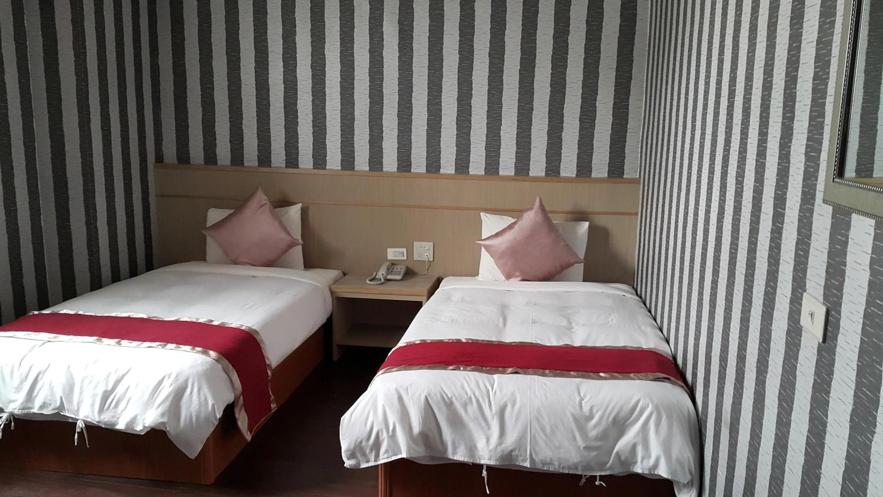 Bed in Mei Hua Hotel