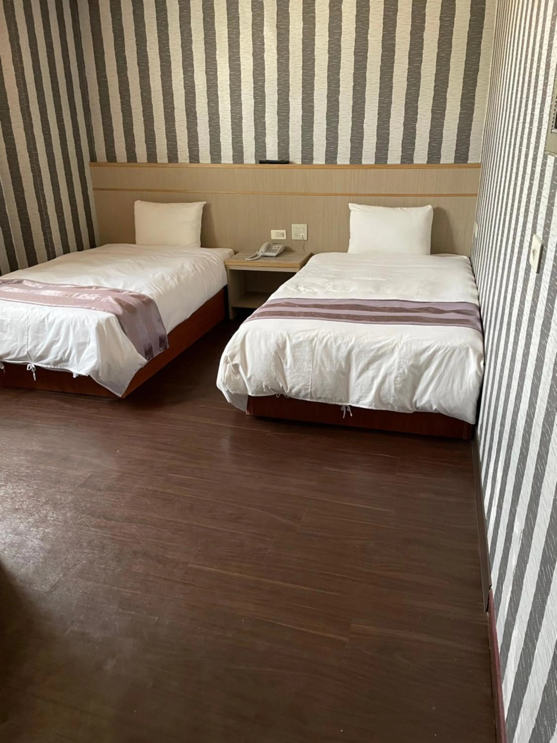 Bed in Mei Hua Hotel