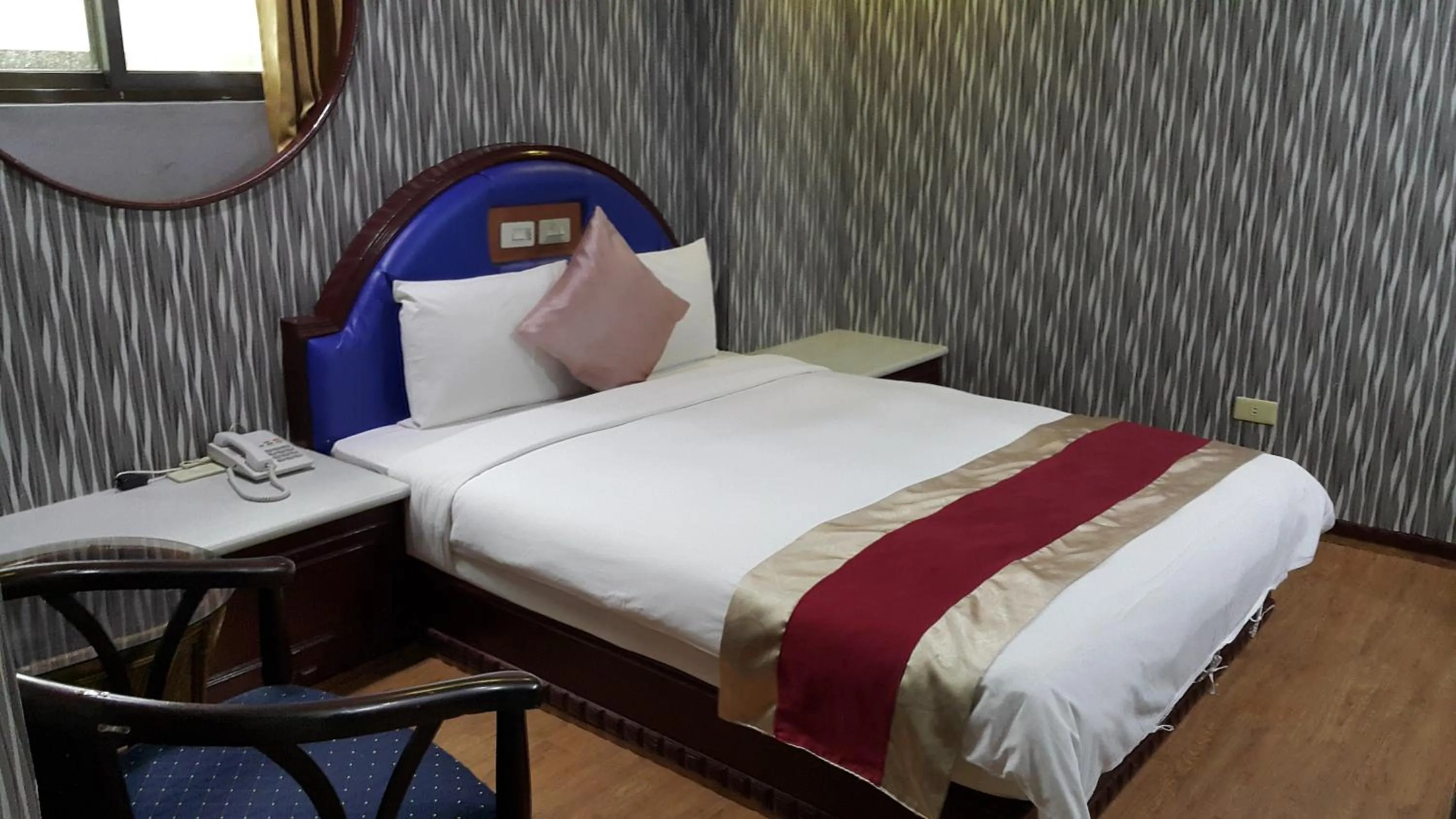 Photo of the whole room, Bed in Mei Hua Hotel