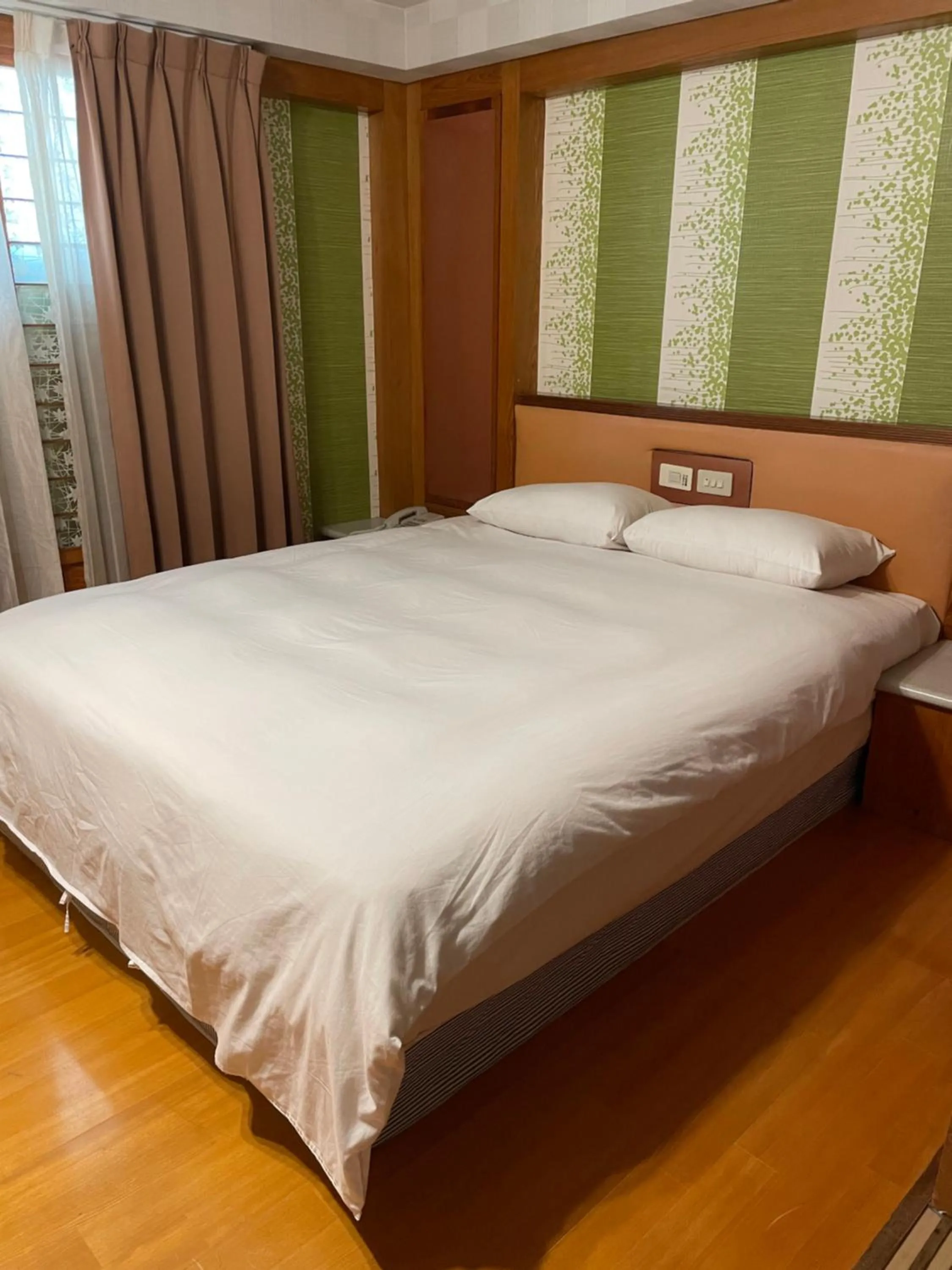 Bed in Mei Hua Hotel