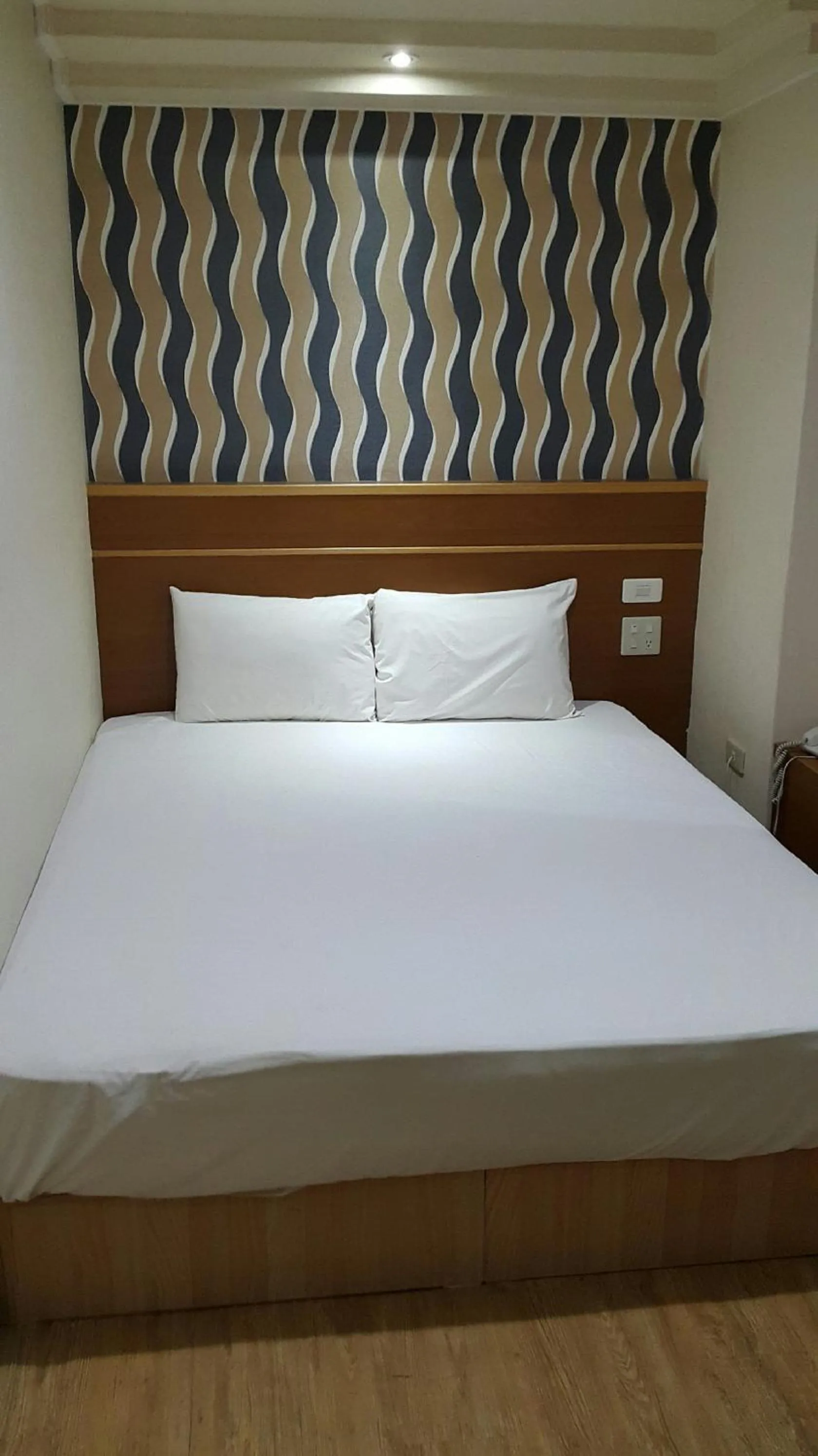 Bed in Mei Hua Hotel