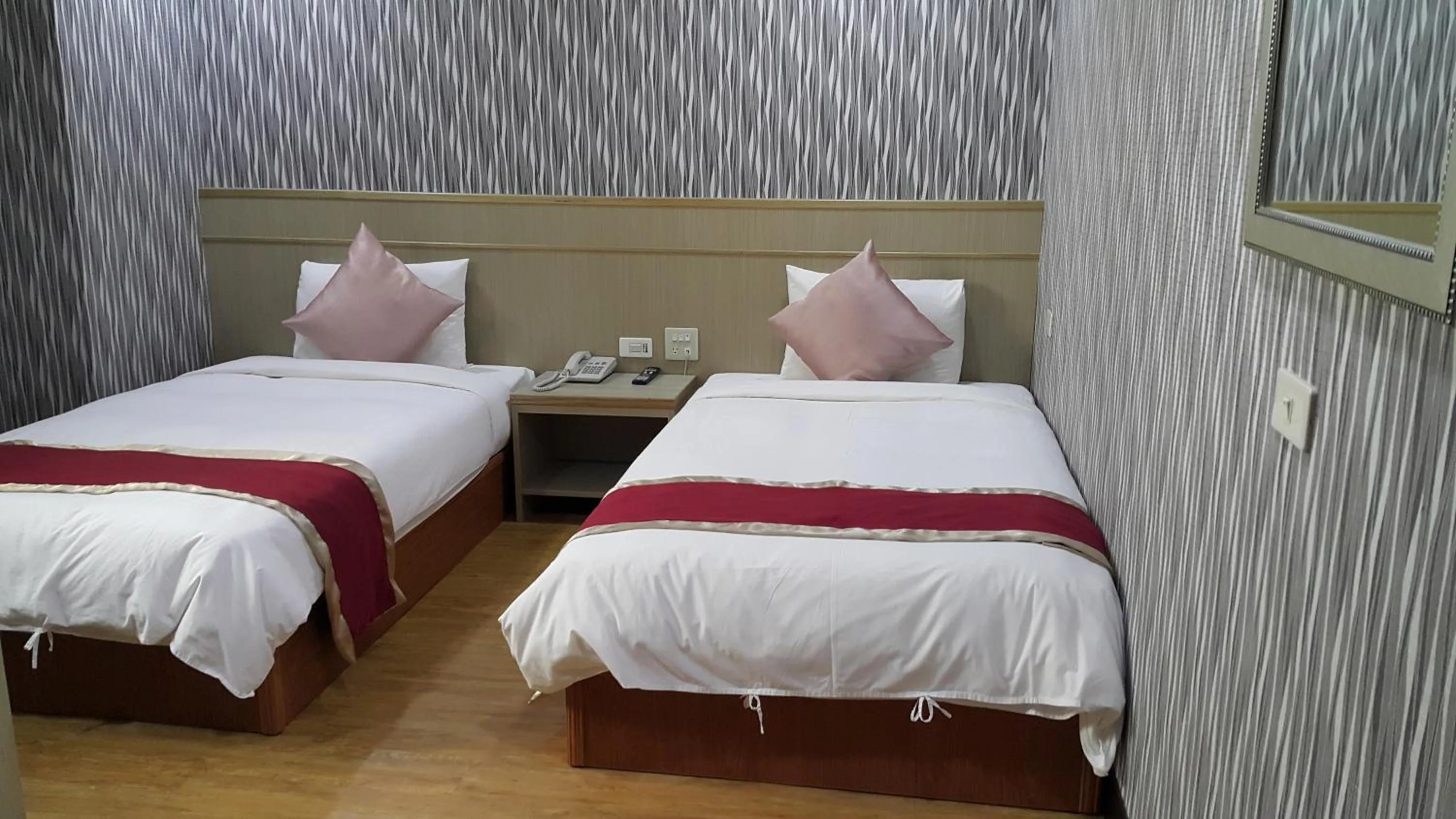 Bed in Mei Hua Hotel