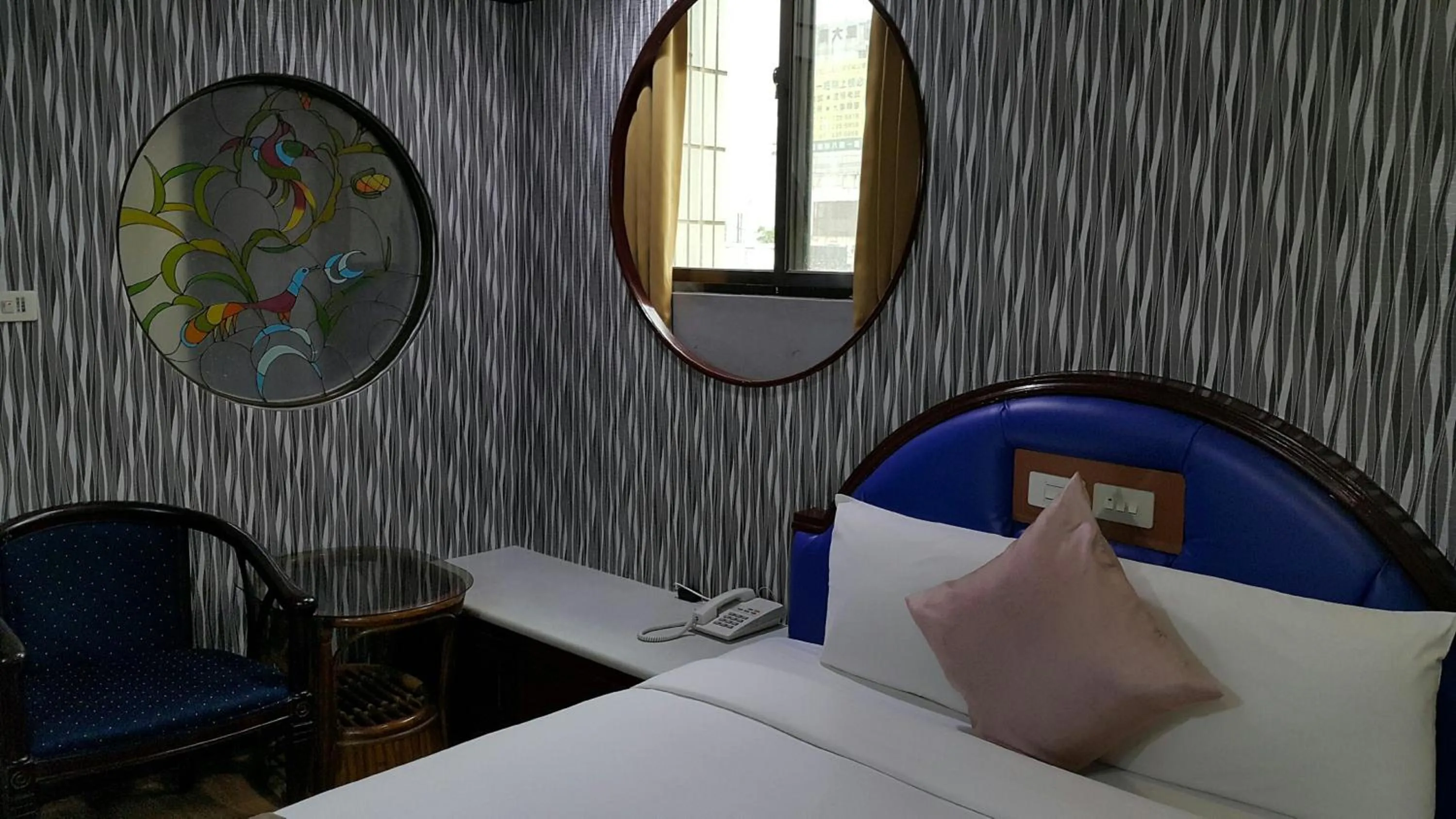 Decorative detail, Bed in Mei Hua Hotel