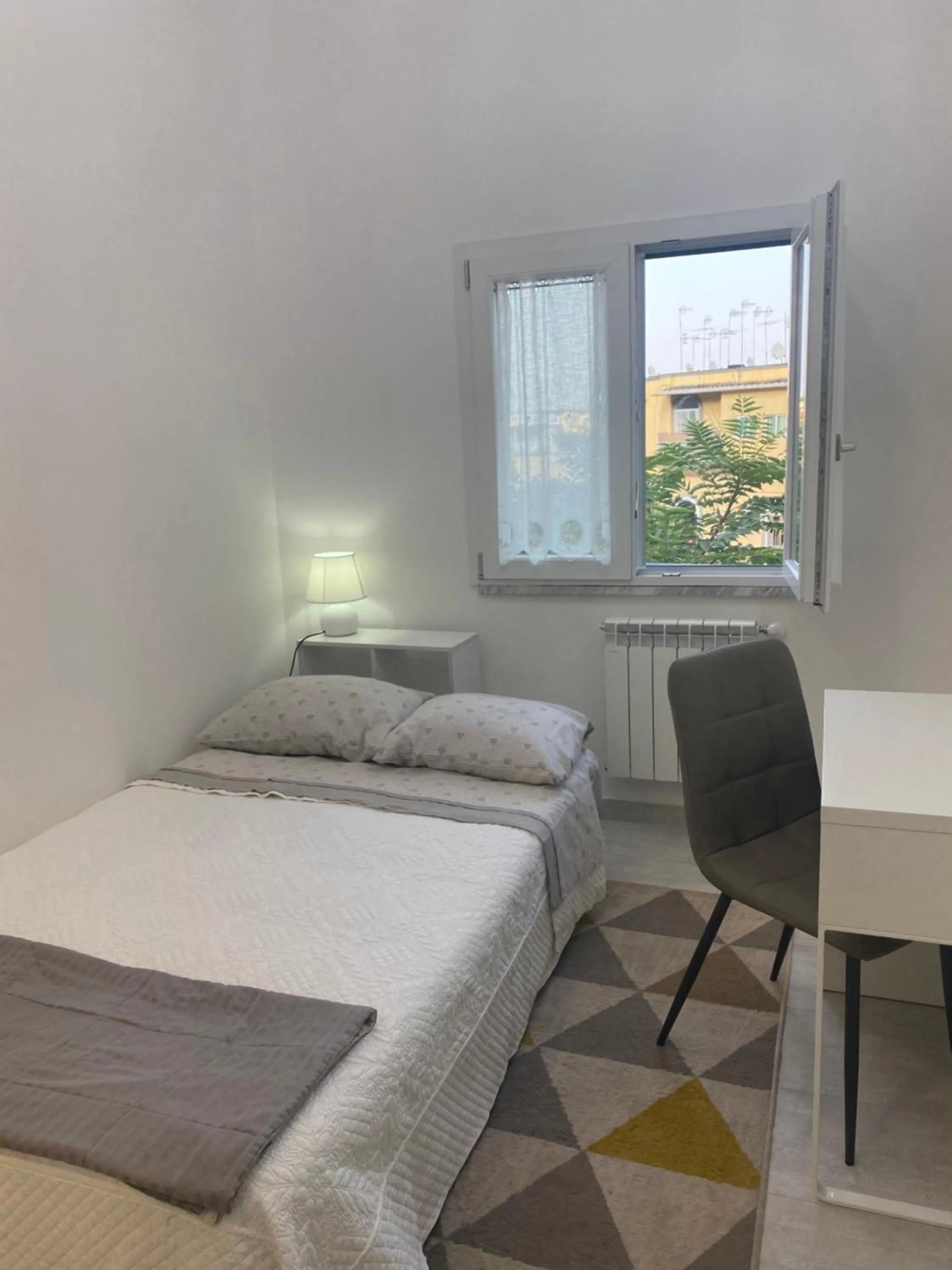 Bed in GARDEN HOUSE Apartments in Naples