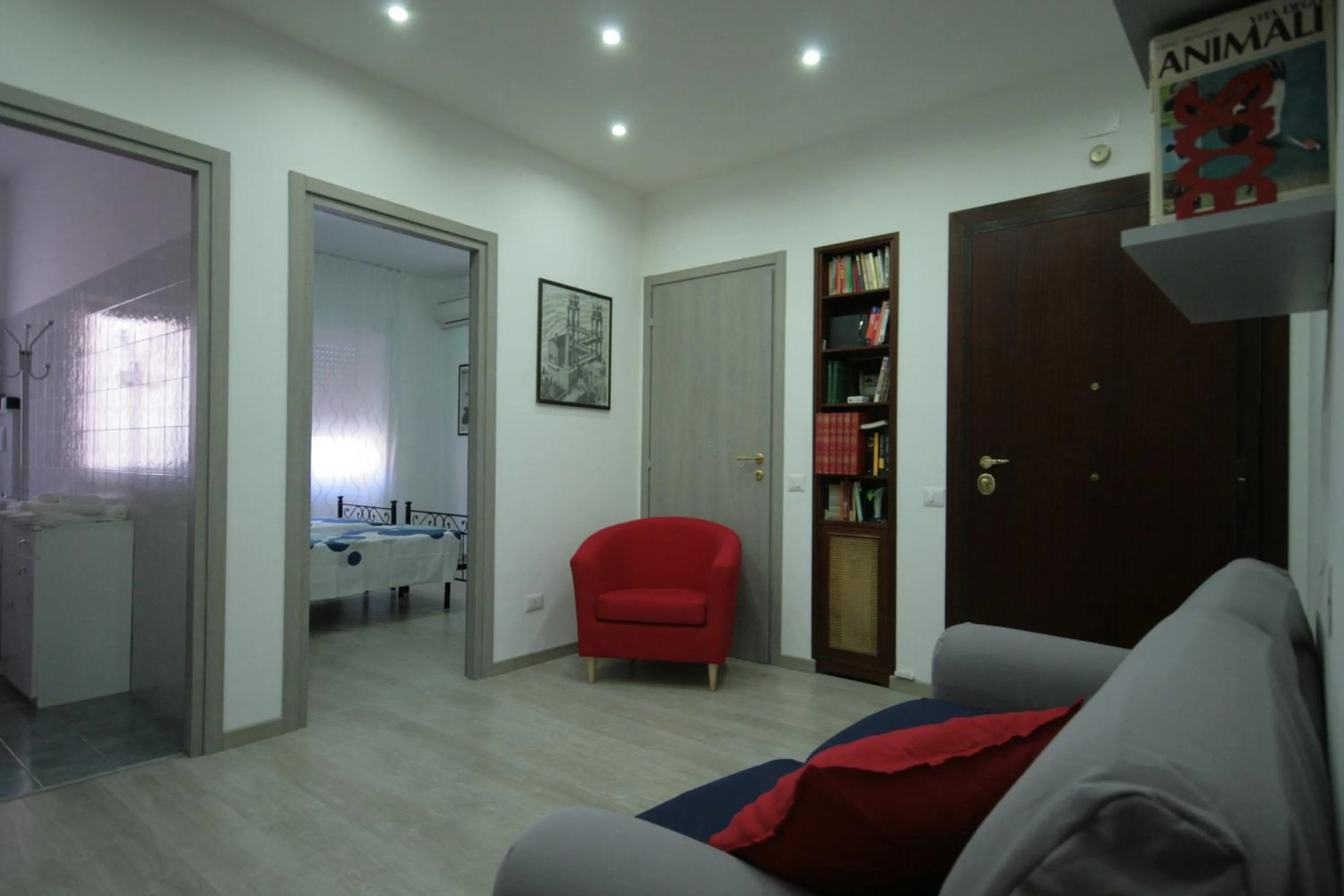 Communal lounge/ TV room, Bed in Casa di Angela