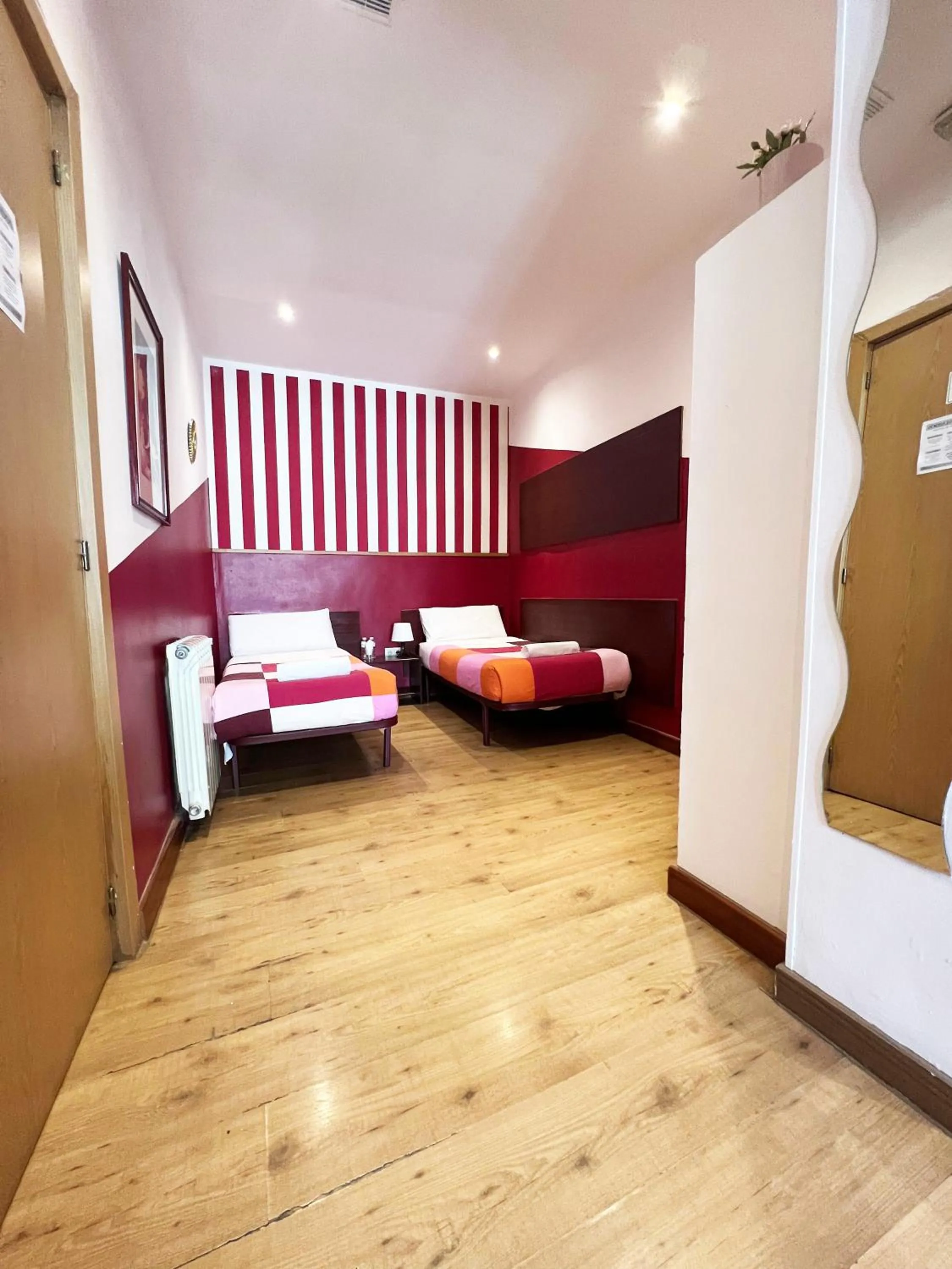 Photo of the whole room, Bed in Hostal La Casa de La Plaza