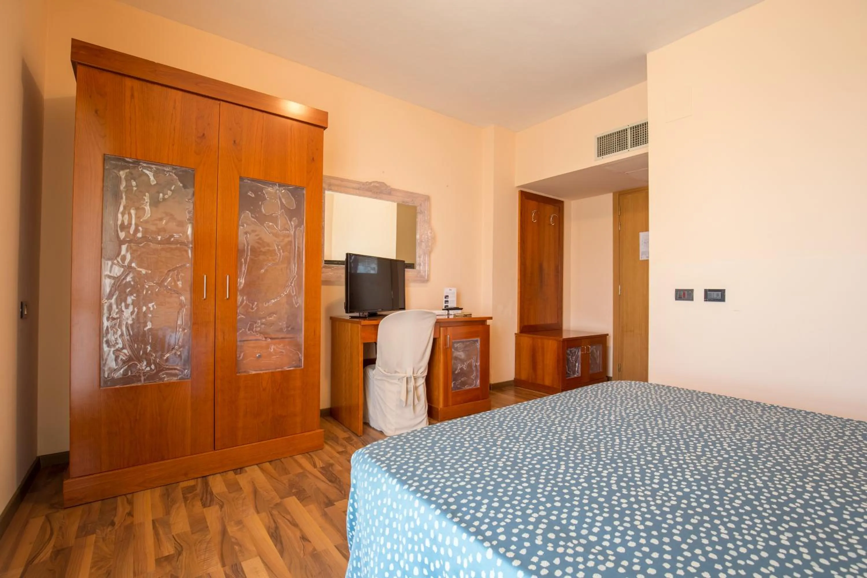 Bed in Hotel L'Aragosta