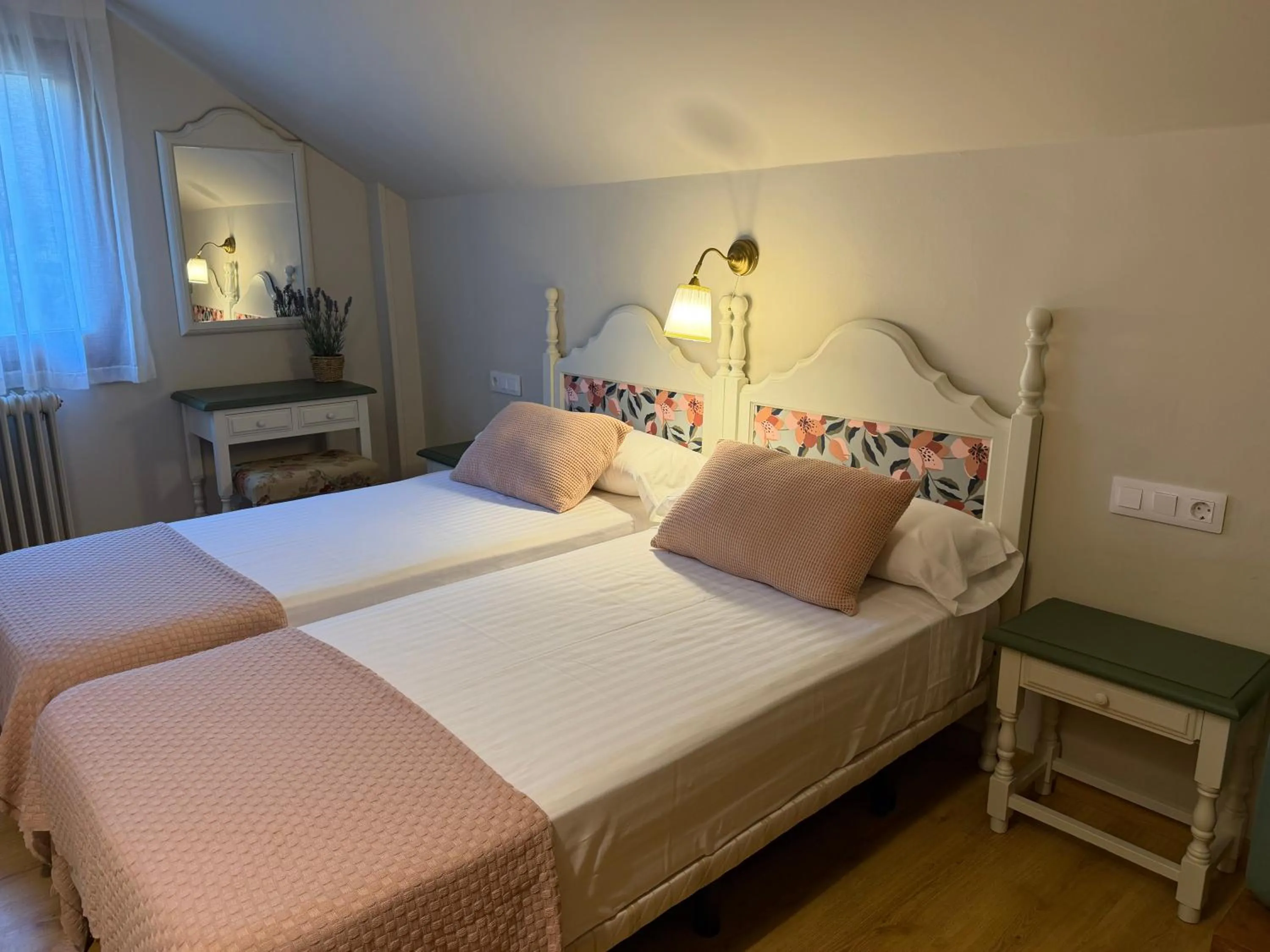 Bed in Edelweiss Hotel