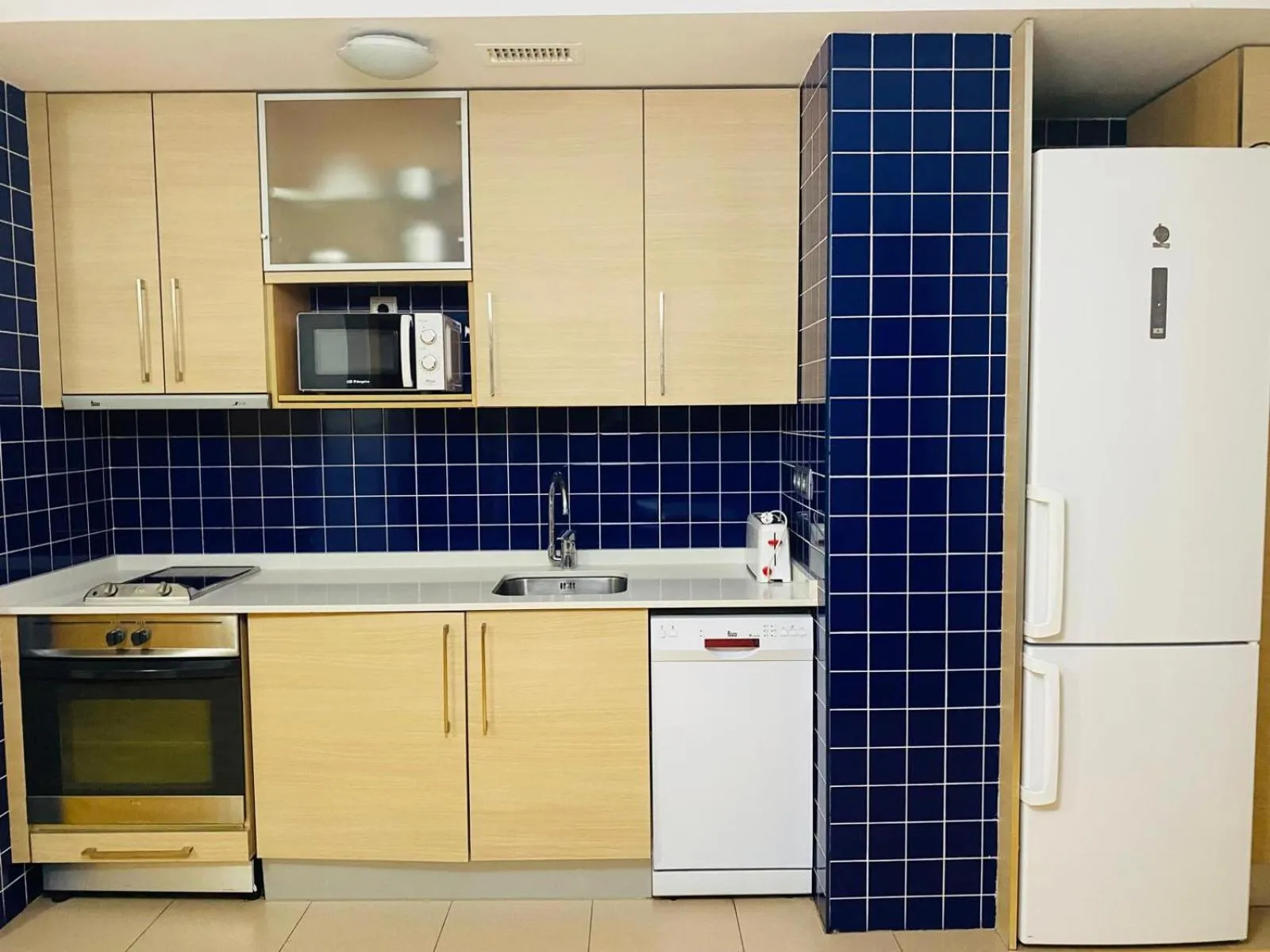 kitchen in Apartamentos Zaragoza Coso