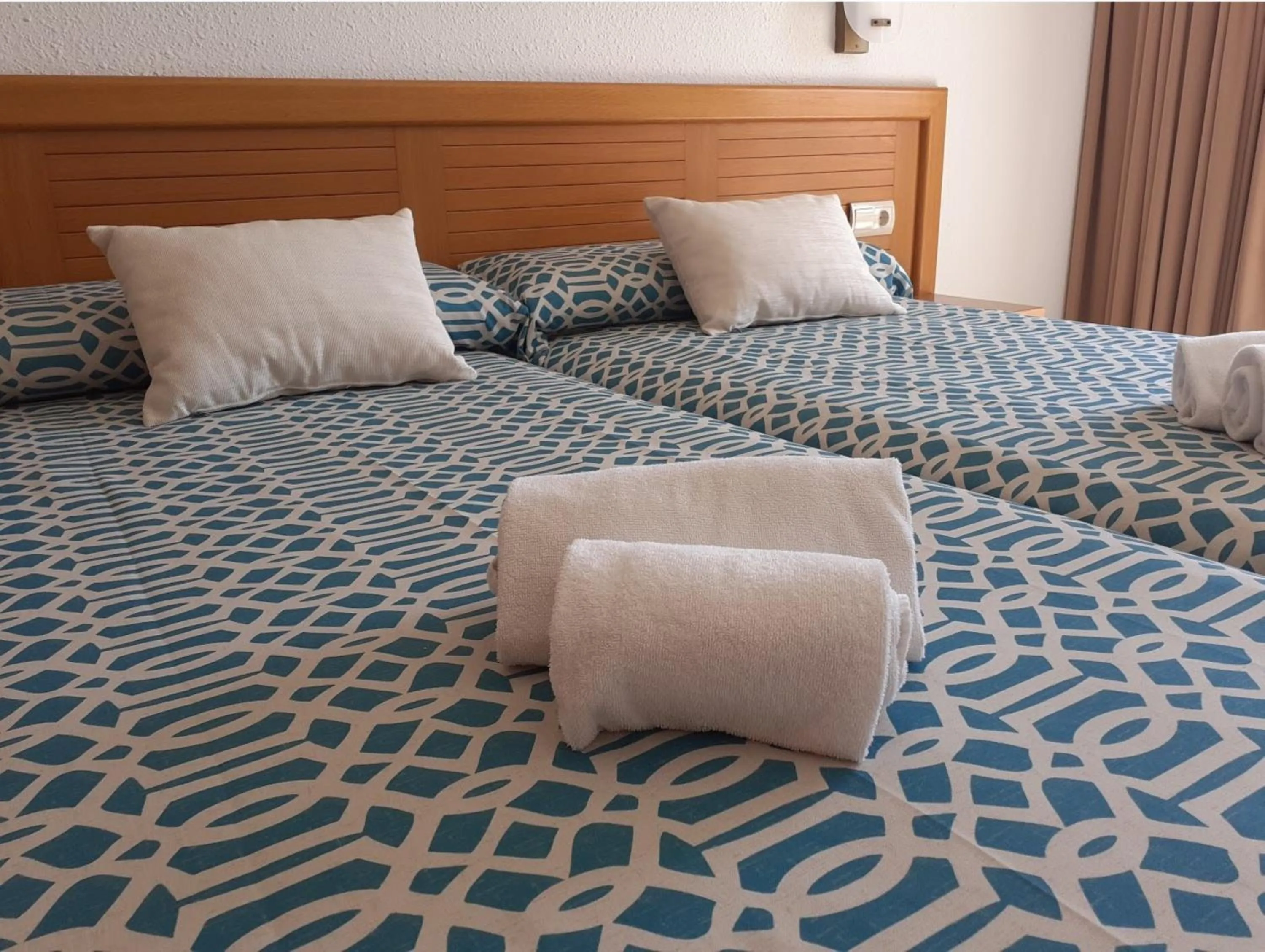 Bed in Aparthotel Golf Beach