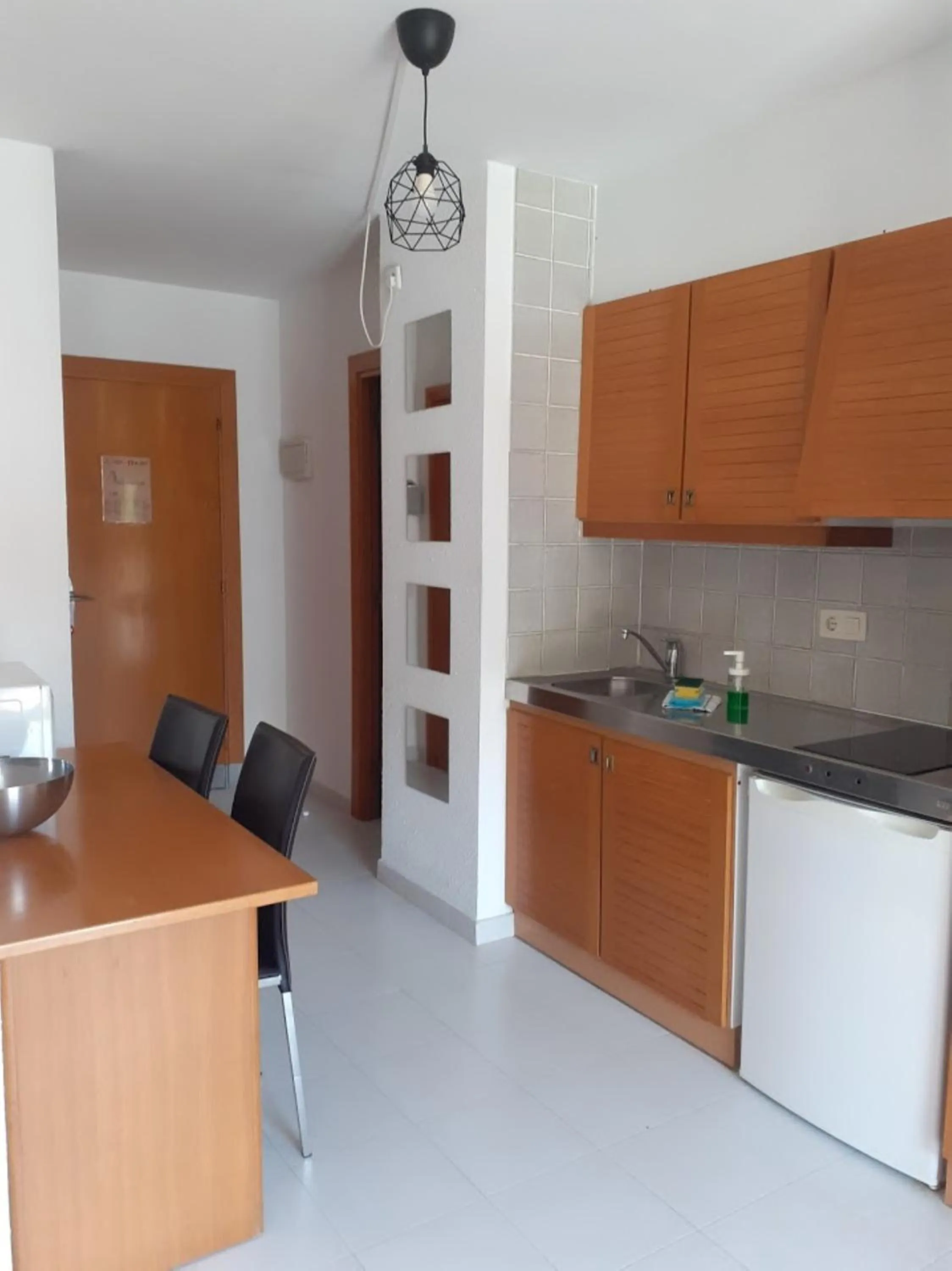 Kitchen or kitchenette in Aparthotel Golf Beach