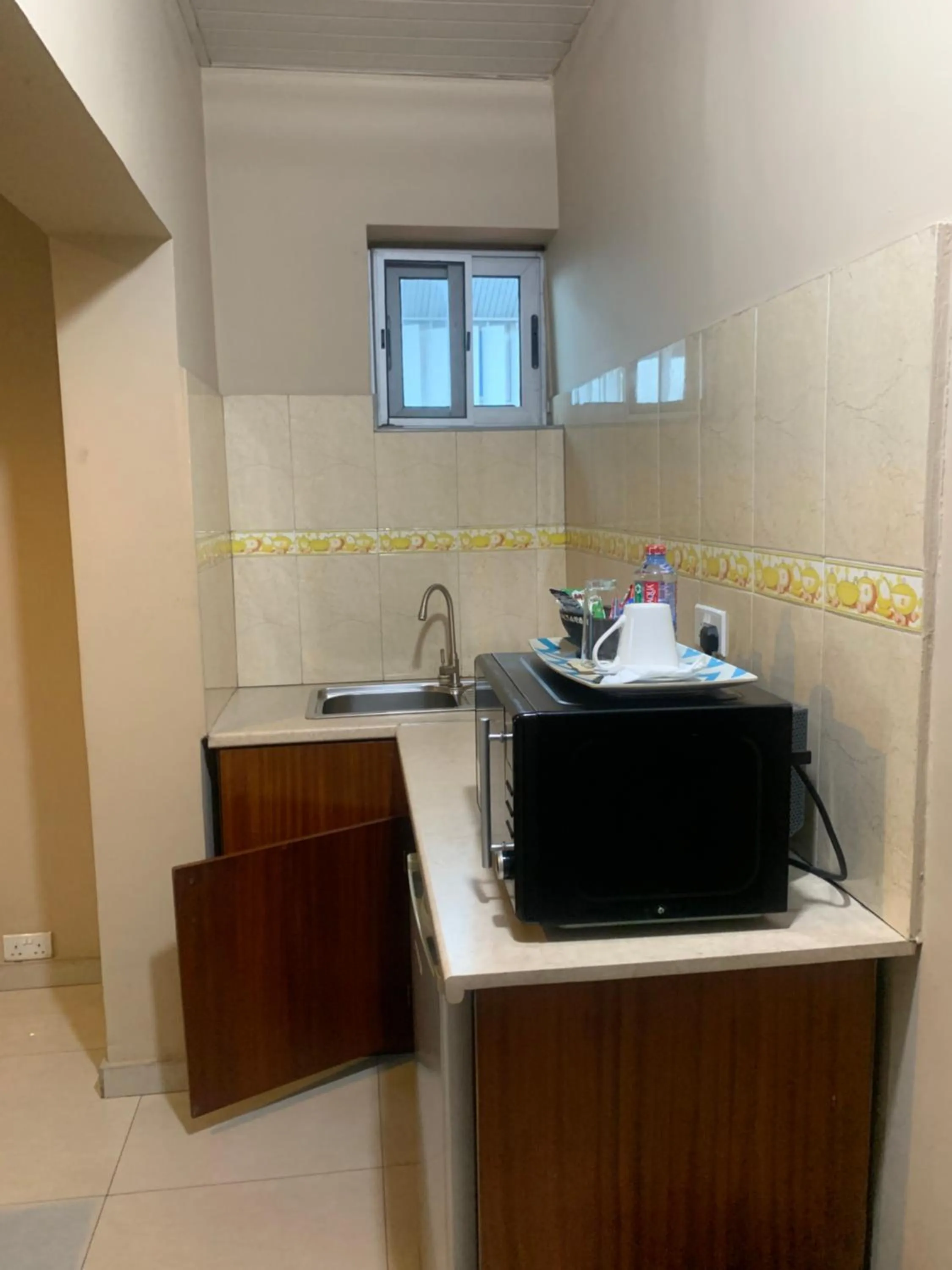 Kitchen or kitchenette in Manjaro Suites