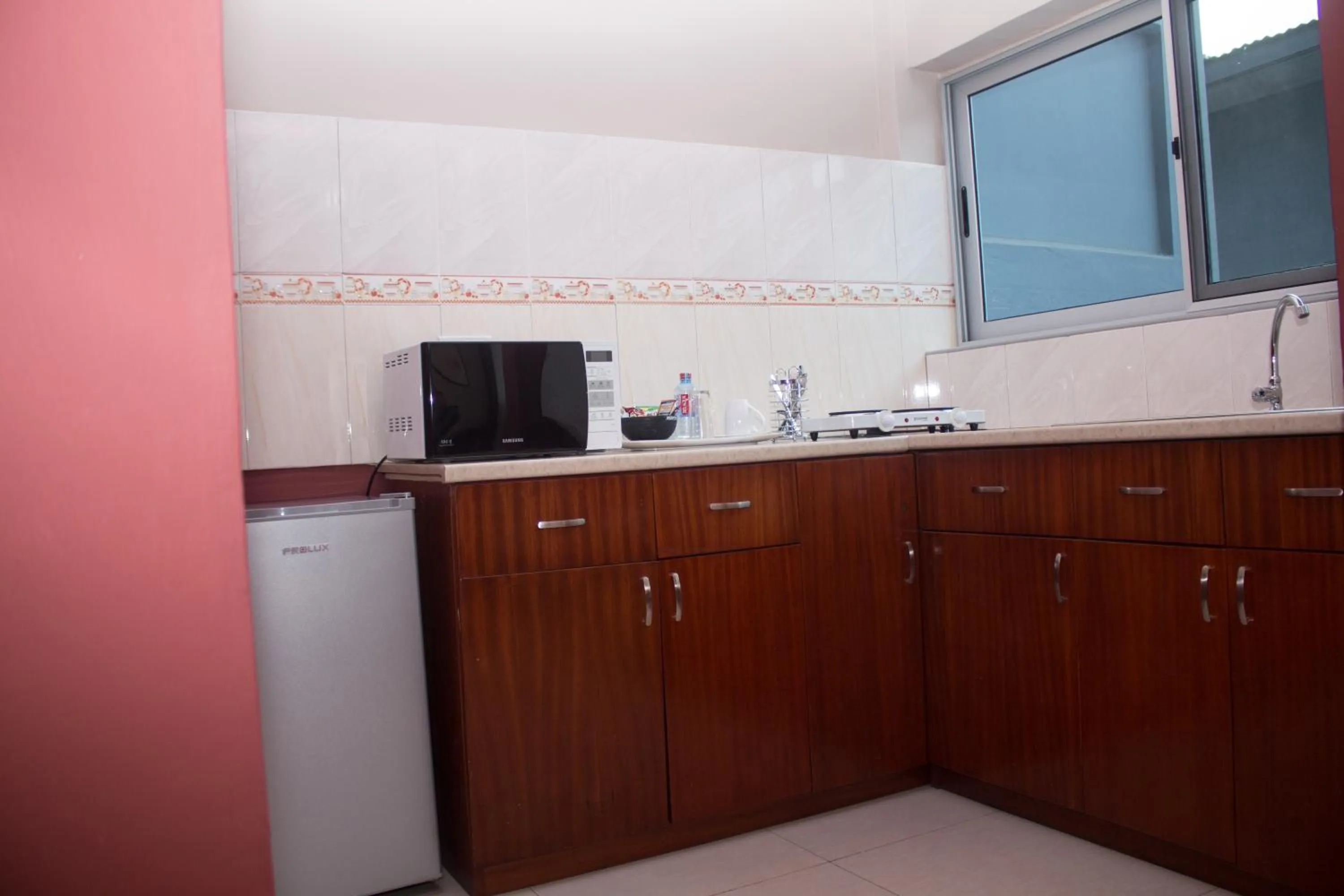 Kitchen or kitchenette in Manjaro Suites