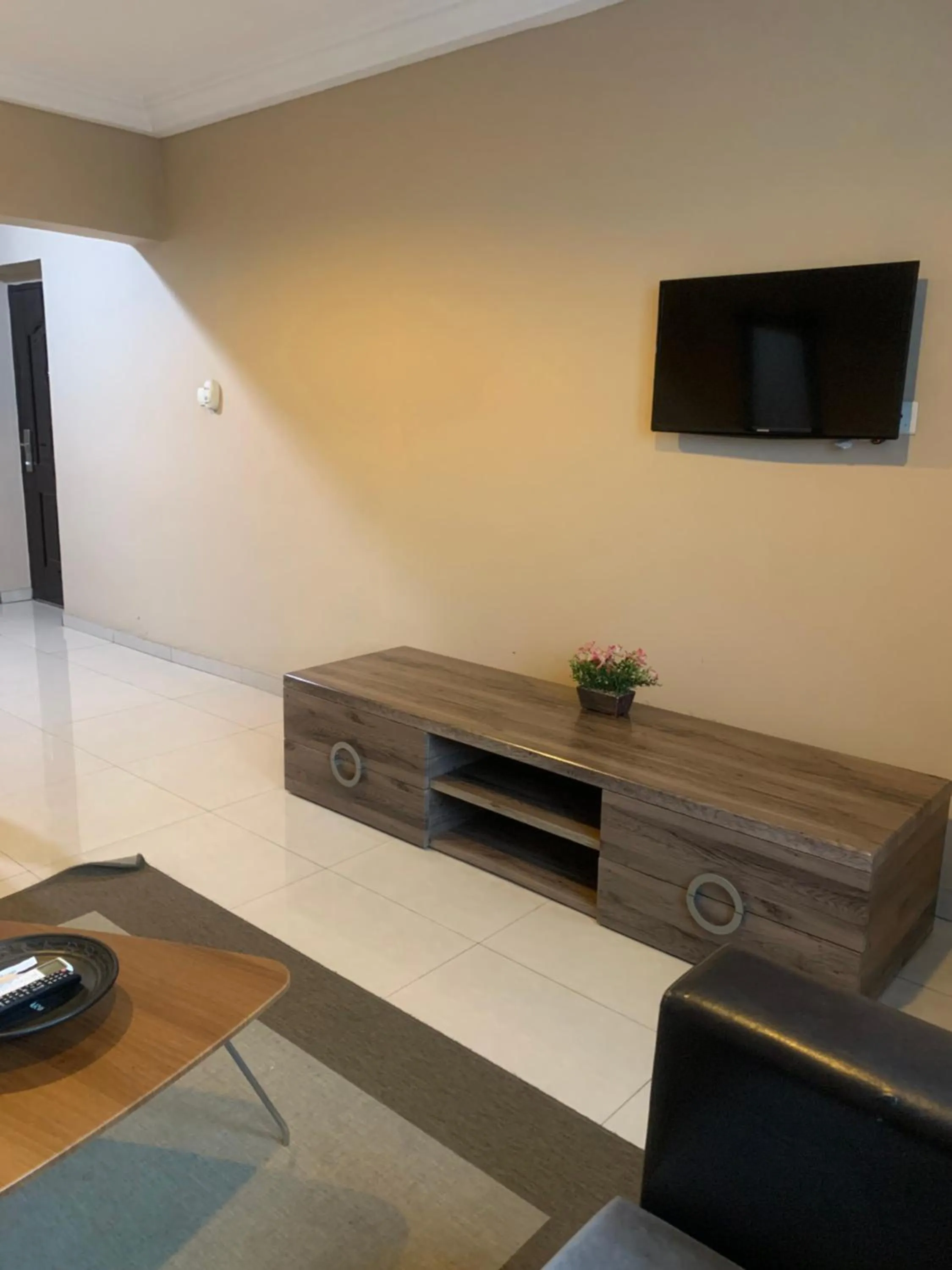 Communal lounge/ TV room in Manjaro Suites