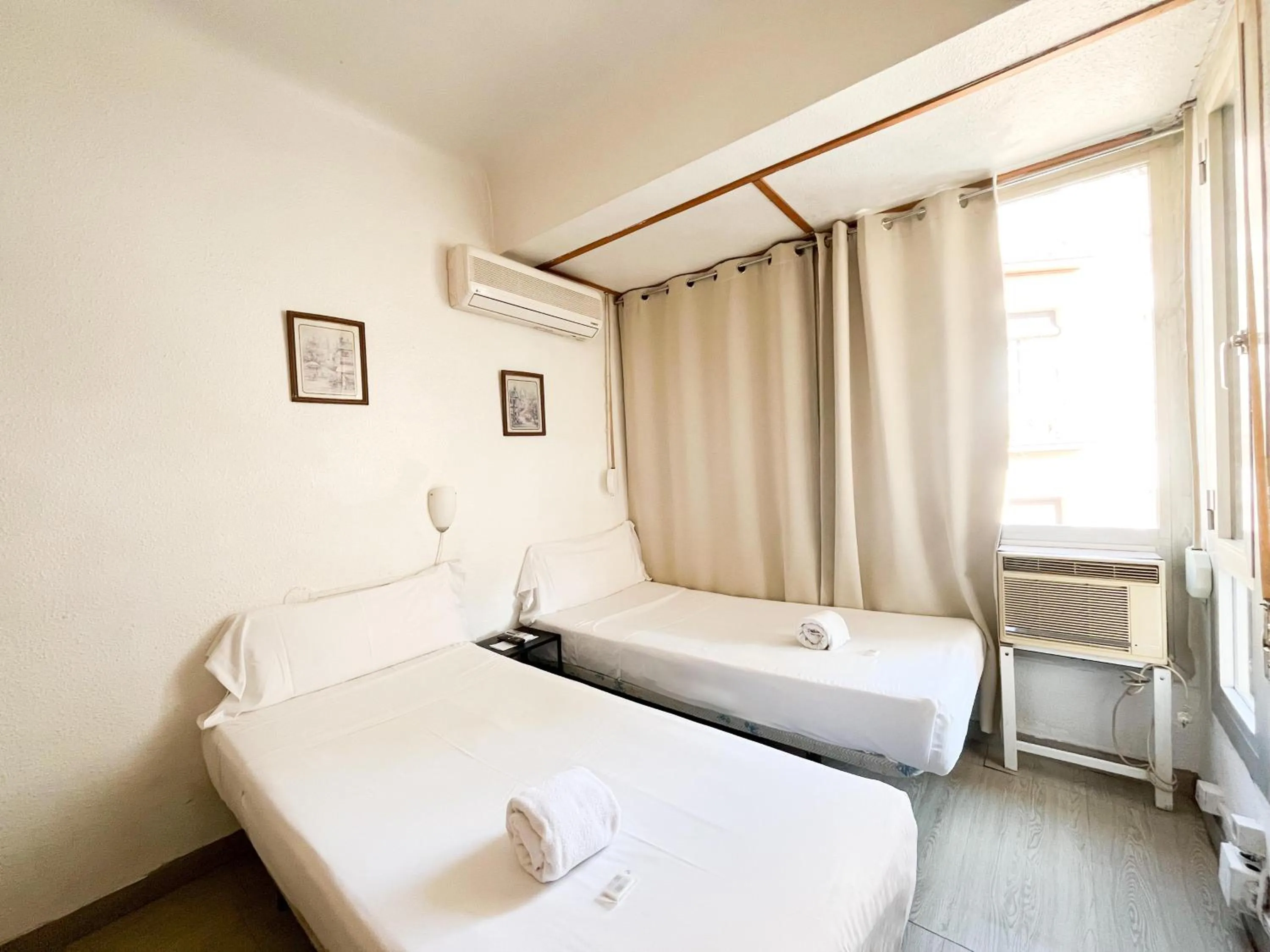 Bed in LÀtic Rooms