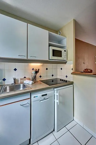Kitchen or kitchenette in Residence Port Guillaume - maeva Home