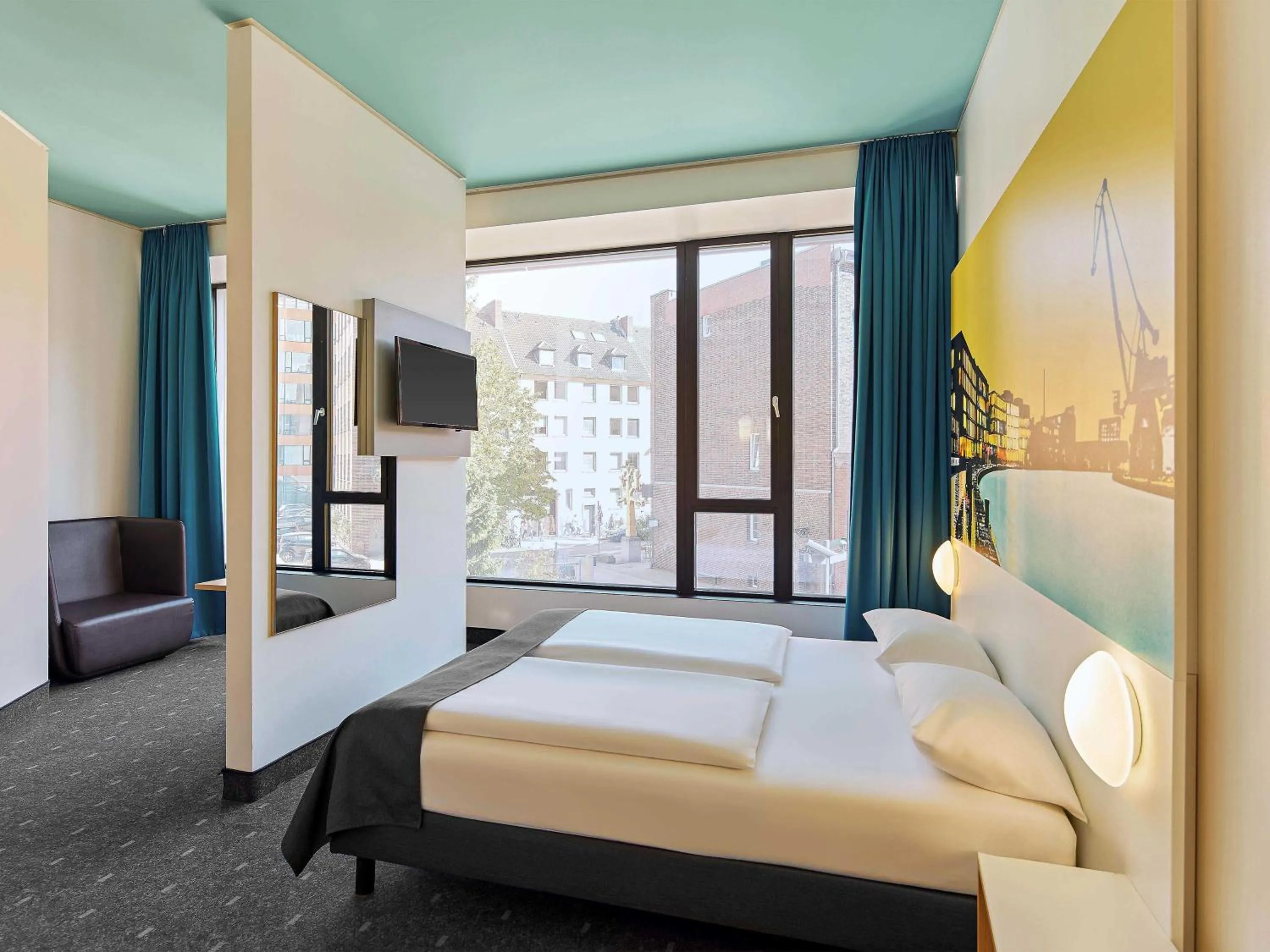 Photo of the whole room, Bed in B&B HOTEL Münster Hafen