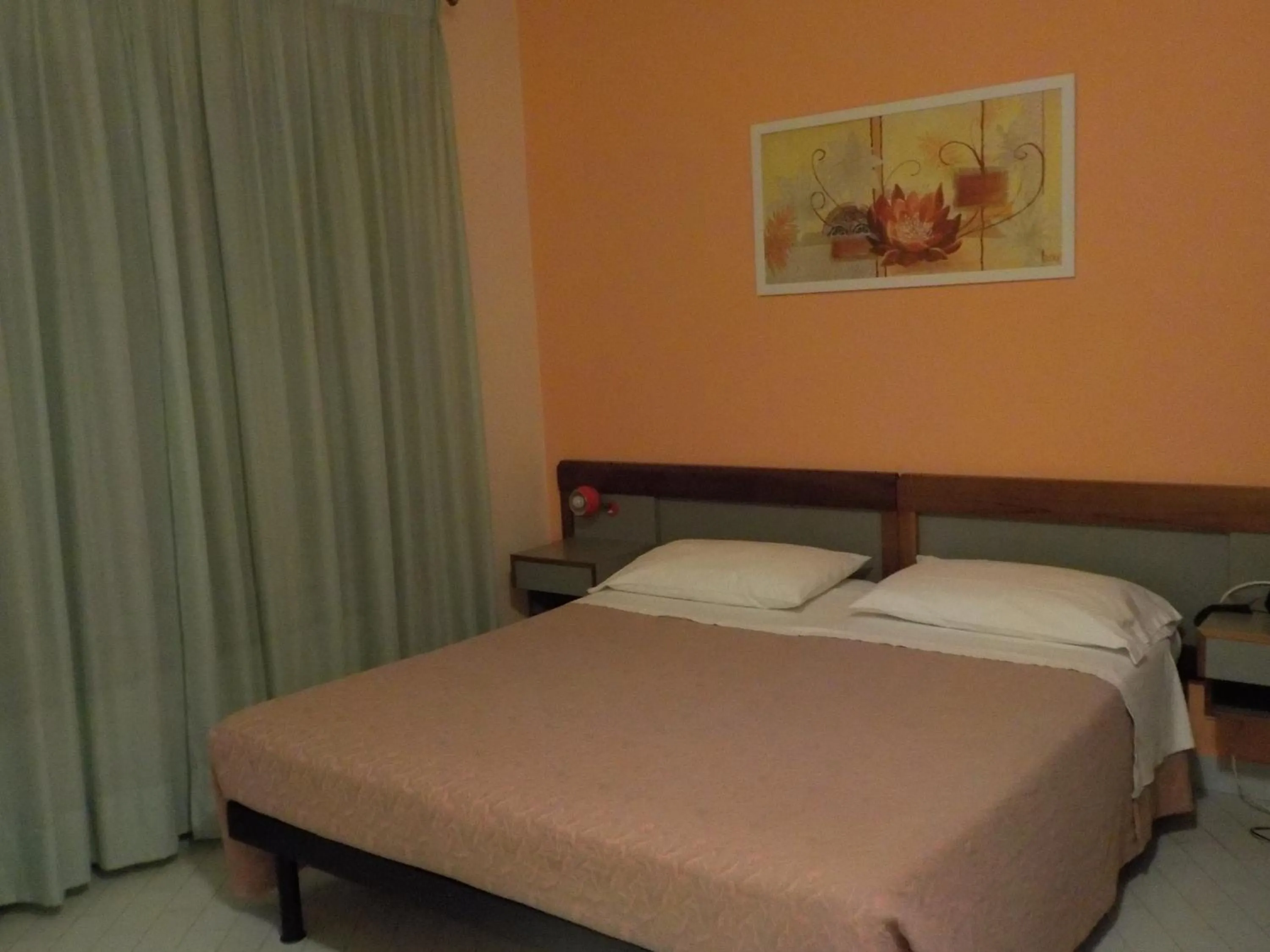 Bedroom in Hotel Le Pleiadi