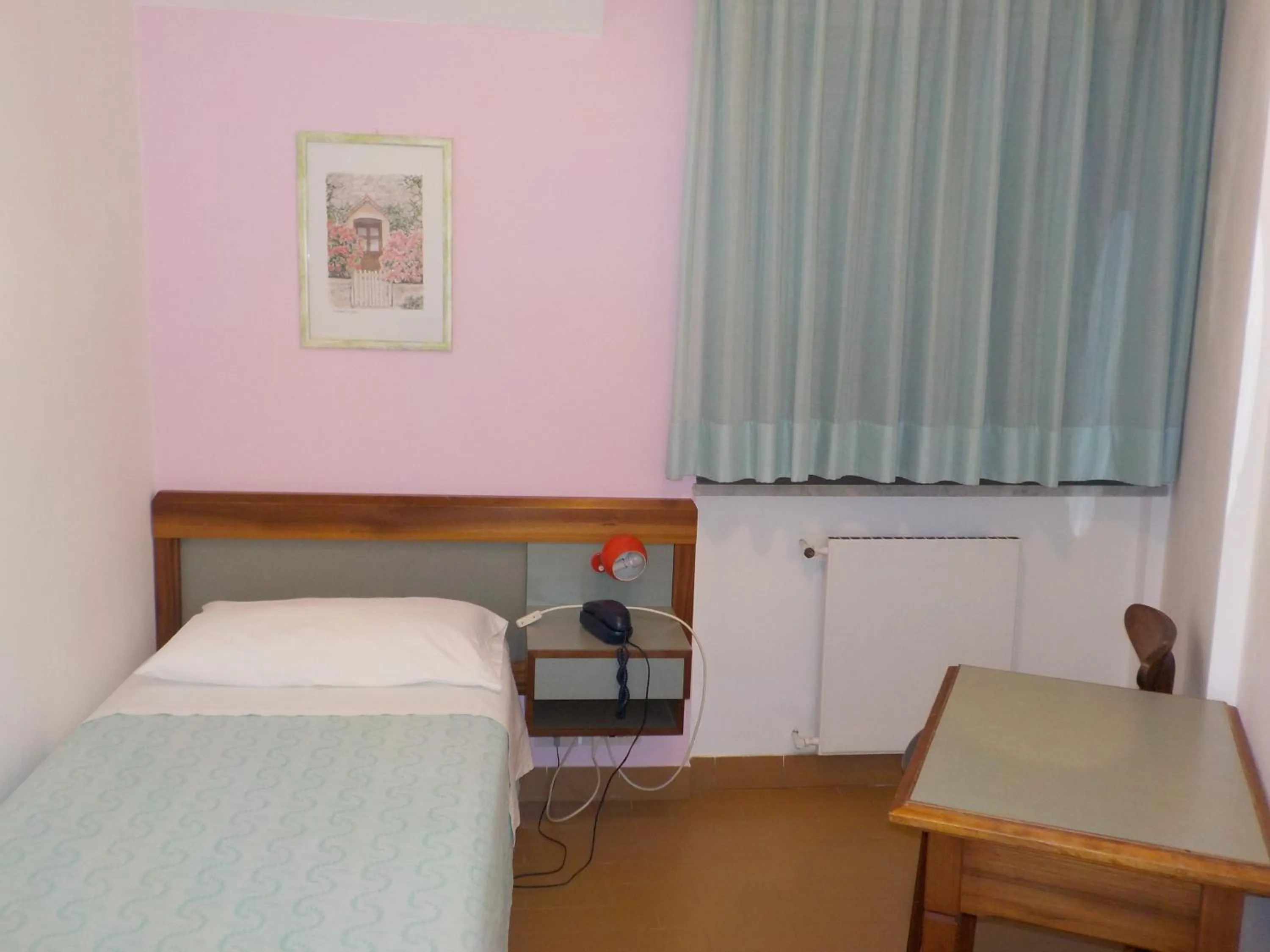 Bed in Hotel Le Pleiadi