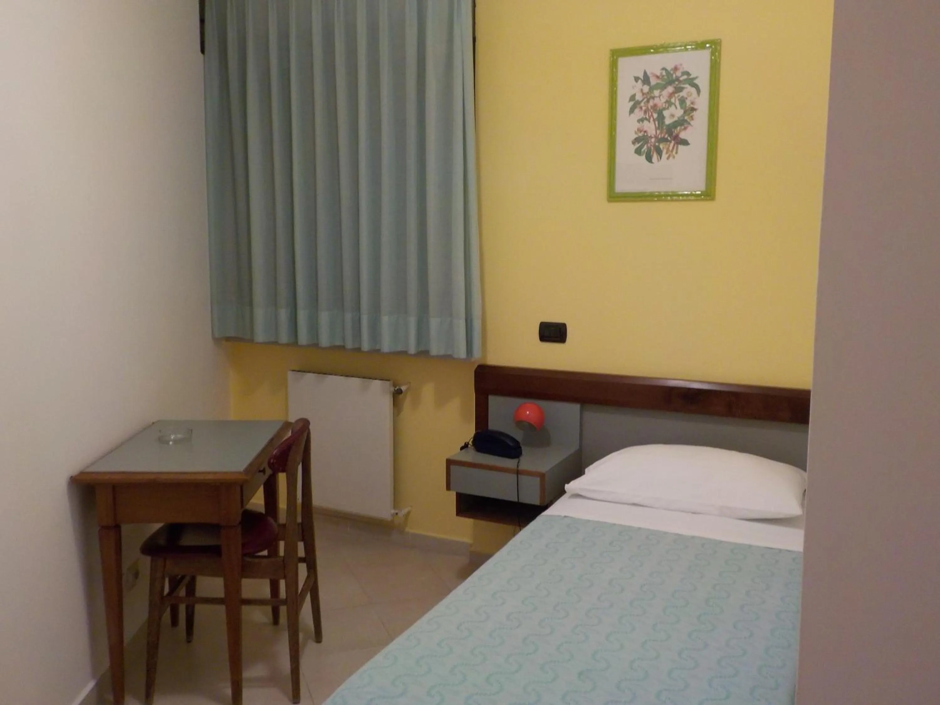 Bed in Hotel Le Pleiadi