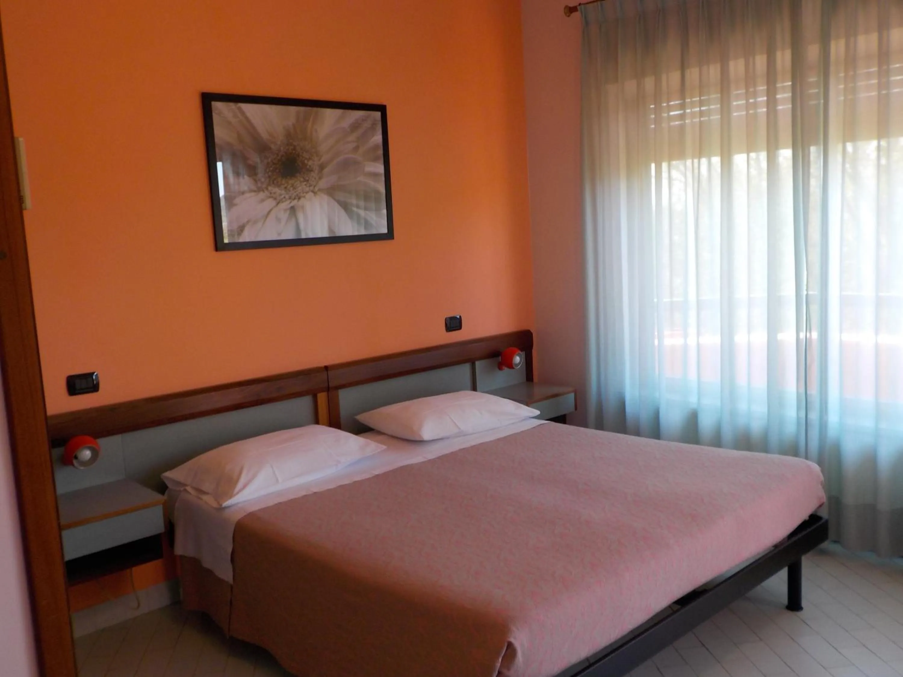 Bed in Hotel Le Pleiadi