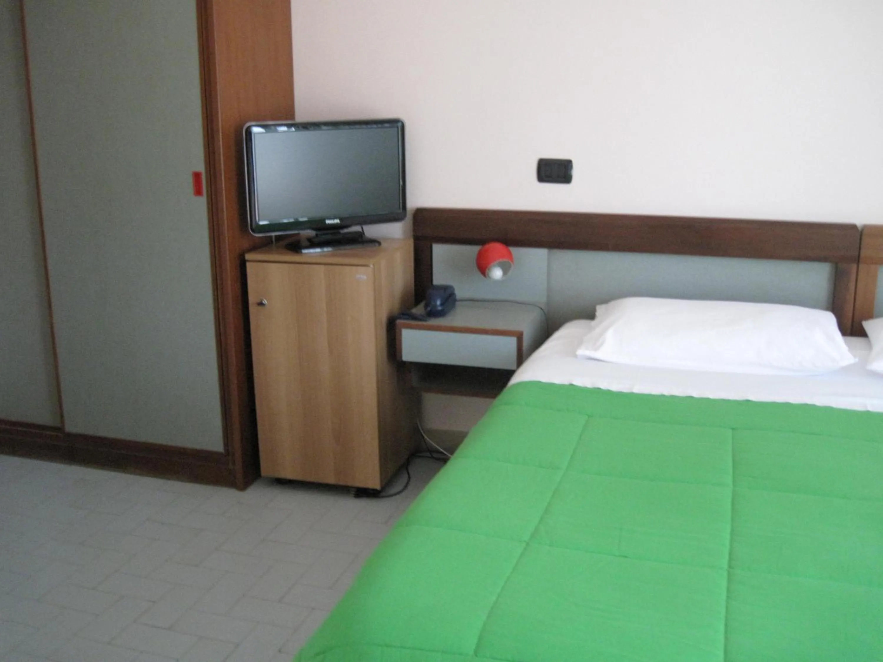 Bed in Hotel Le Pleiadi