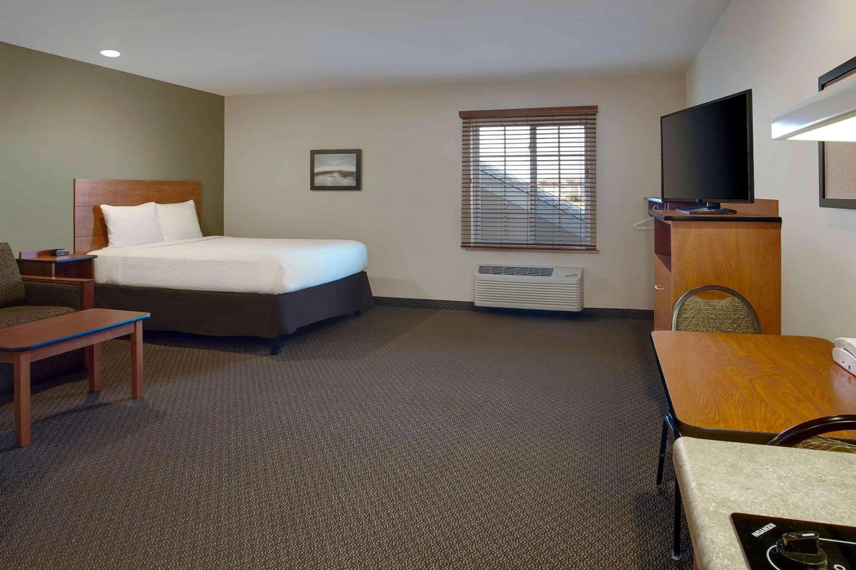Photo of the whole room, Bed in WoodSpring Suites Frederick I-70