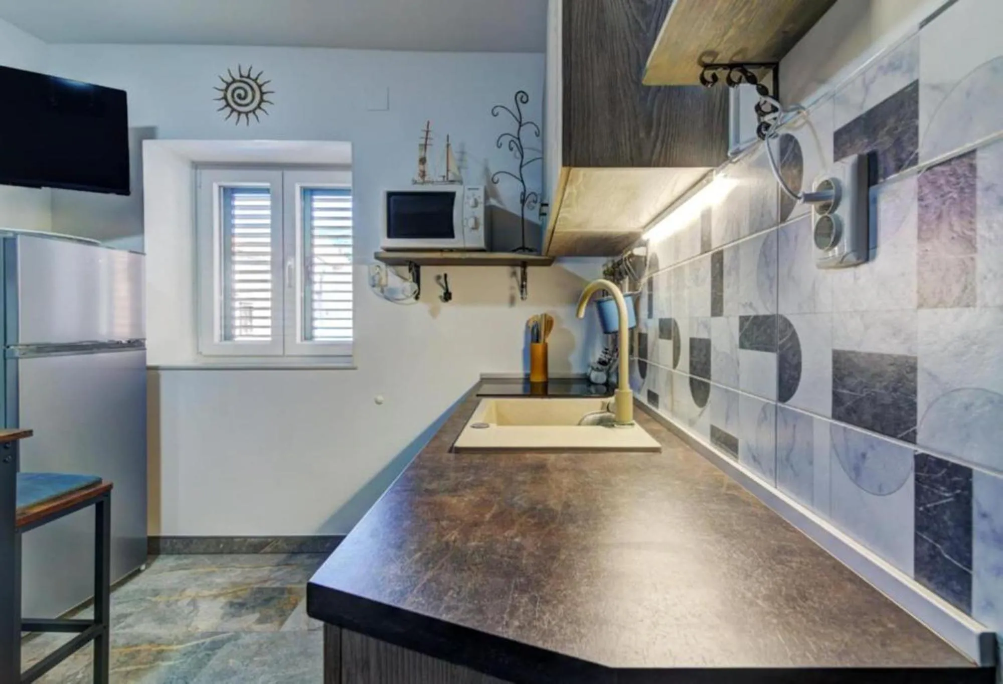 Kitchen or kitchenette in City Apartments & Studio App Frankopan