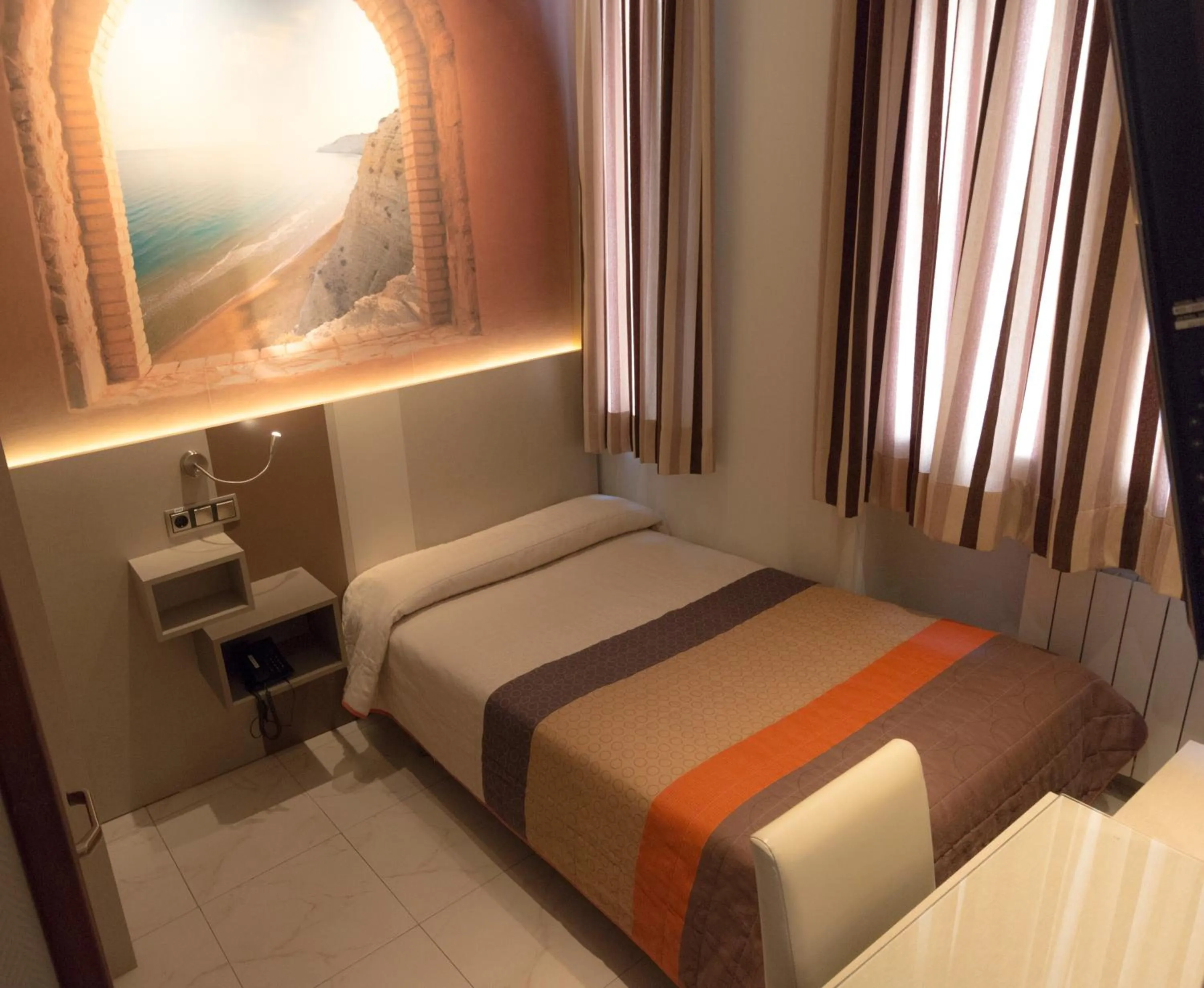 Bed in Hostal Atocha Almudena Martín