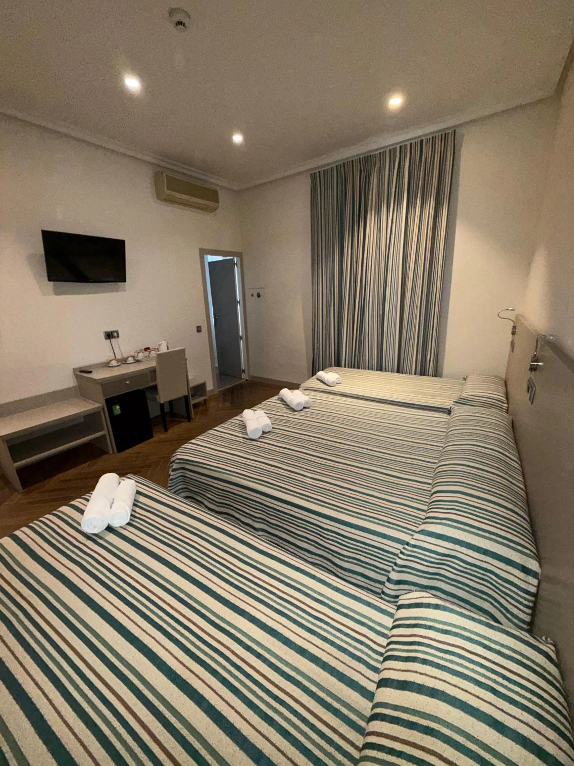 Bed in Hostal Atocha Almudena Martín